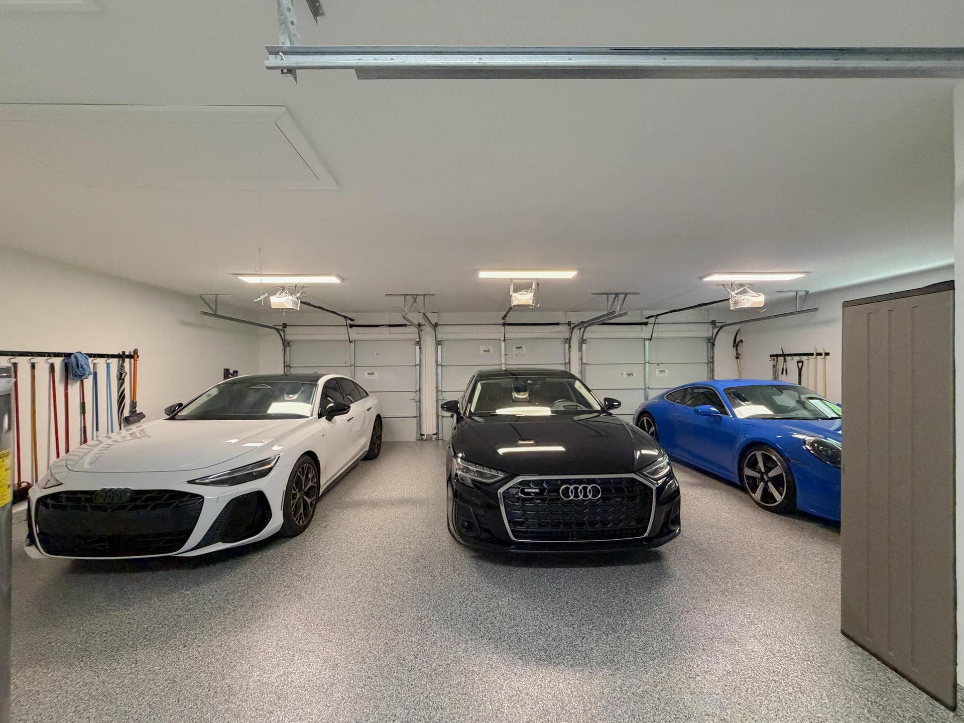 Huge 3 car garage with separate Golf Cart garage
