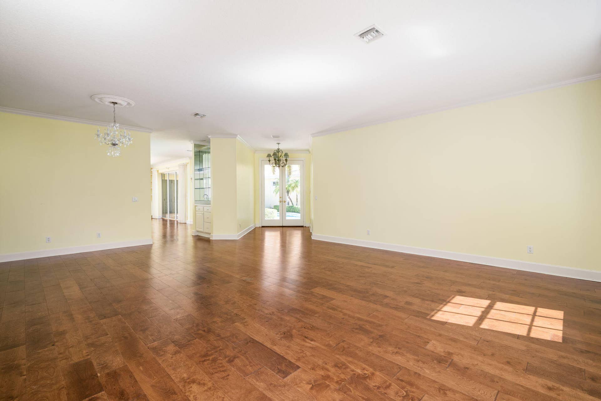 living room, dining room and front foyer with extra sq footage