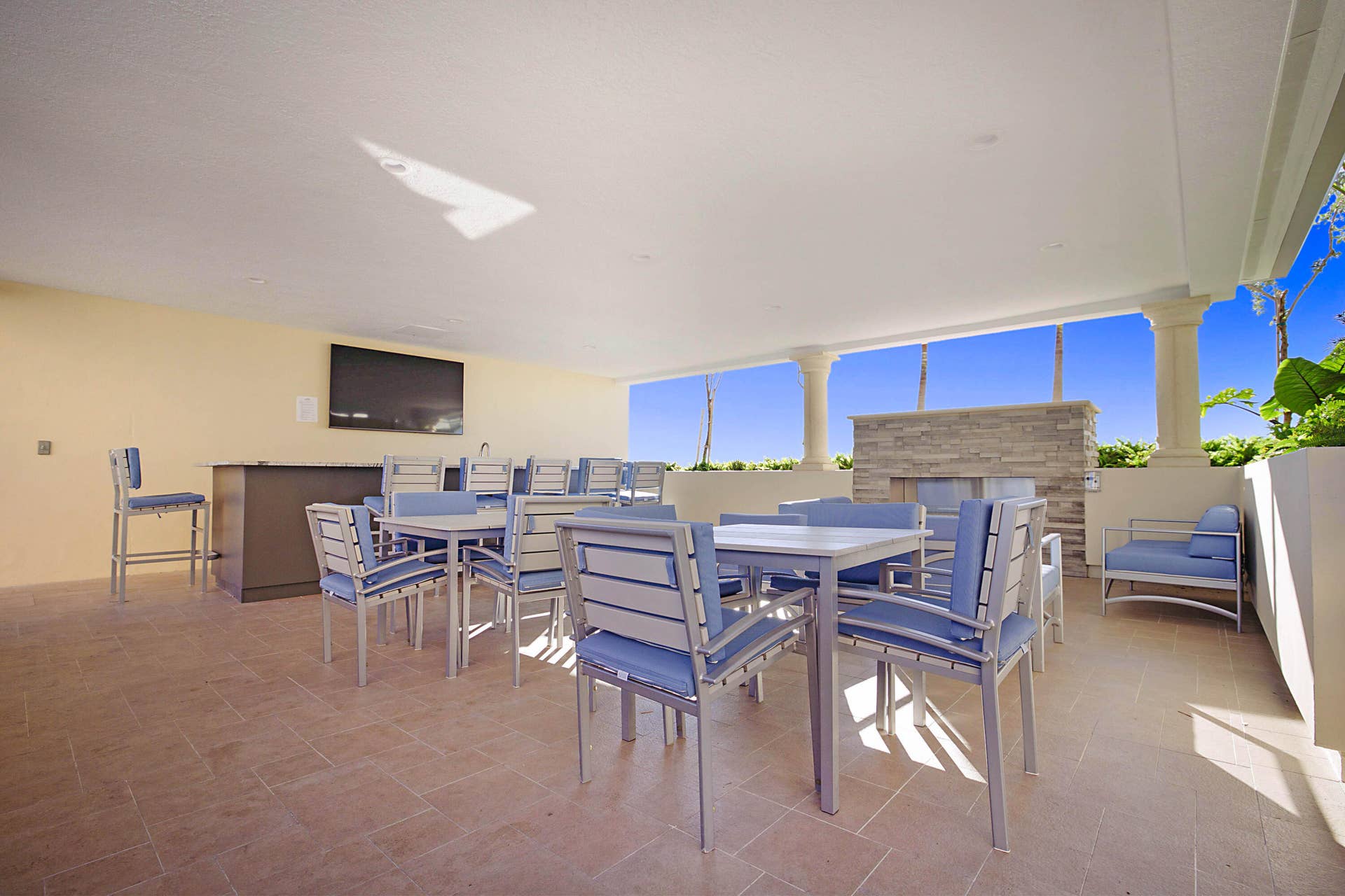 2640 LAKE SHORE Drive, #1711, Riviera Beach, FL 33404 EATING AREA WITH FIRE PIT