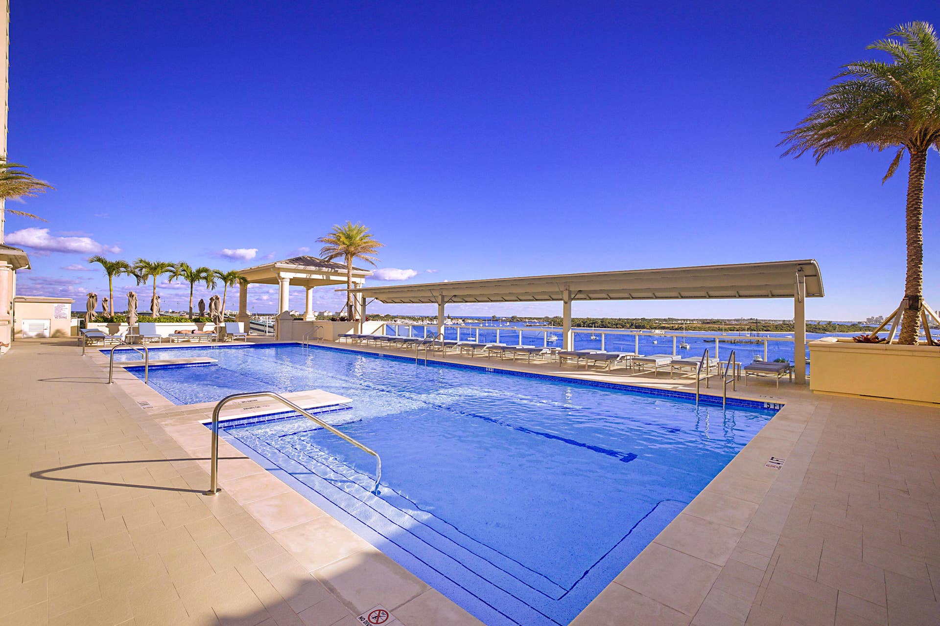 2640 LAKE SHORE Drive, #1711, Riviera Beach, FL 33404 UNOBSTRUCTED WATER VIEWS FROM POOL DECK