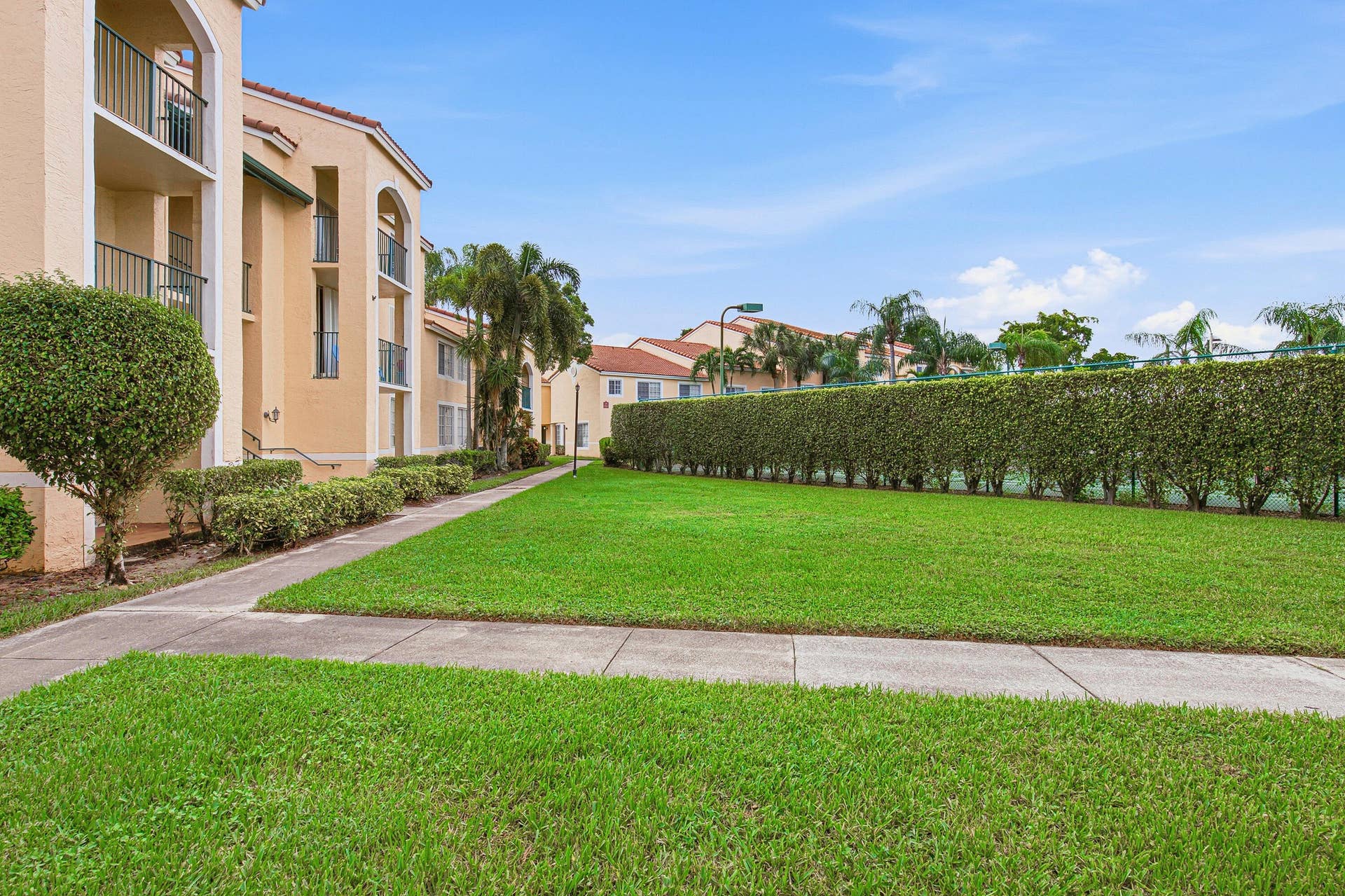 1743 Village Boulevard, #304, West Palm Beach, FL 33409 Front Home-Courtyard