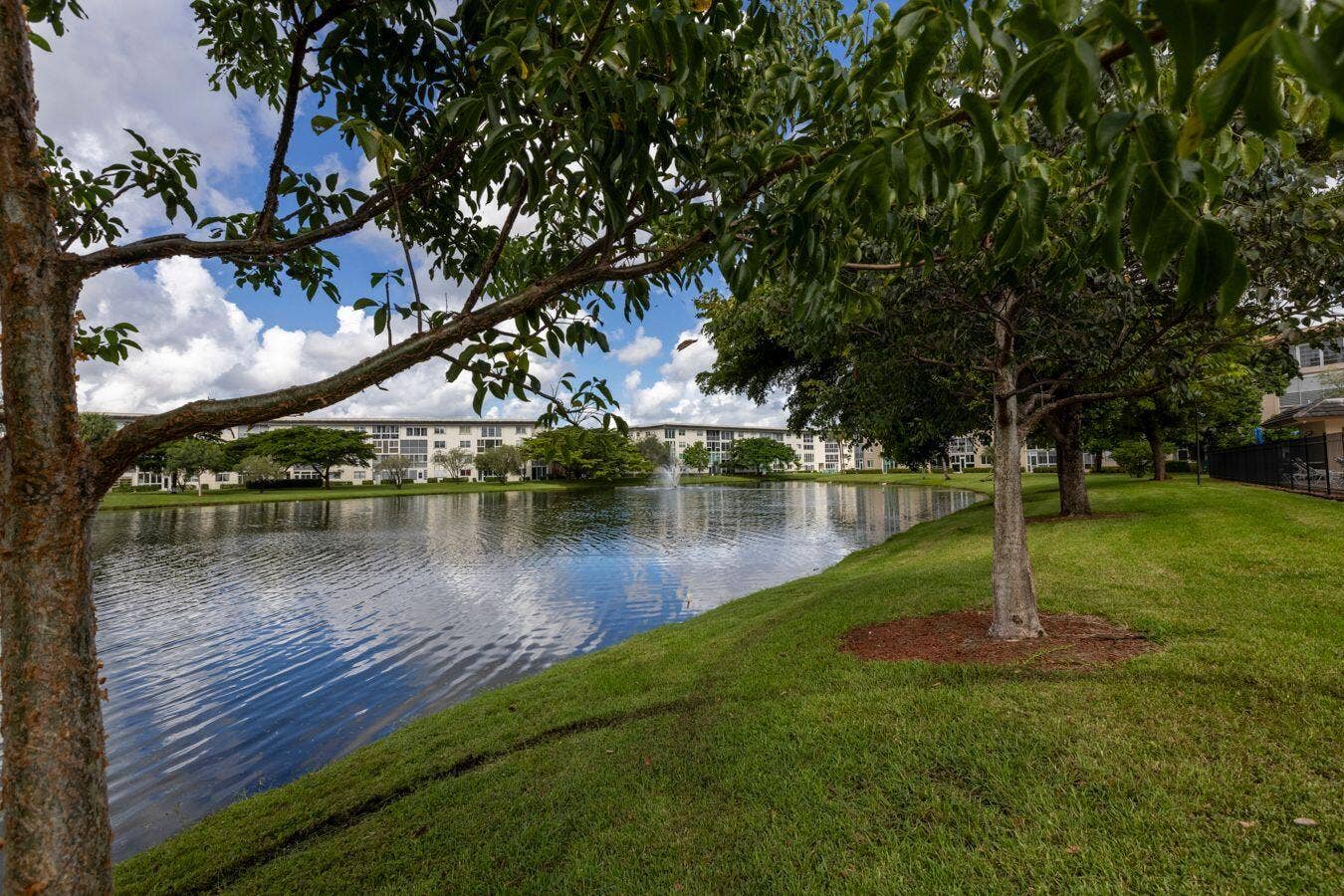 1703 Andros Isle, #J1, Coconut Creek, FL 33066 Peaceful Lake view from Screened in Patio