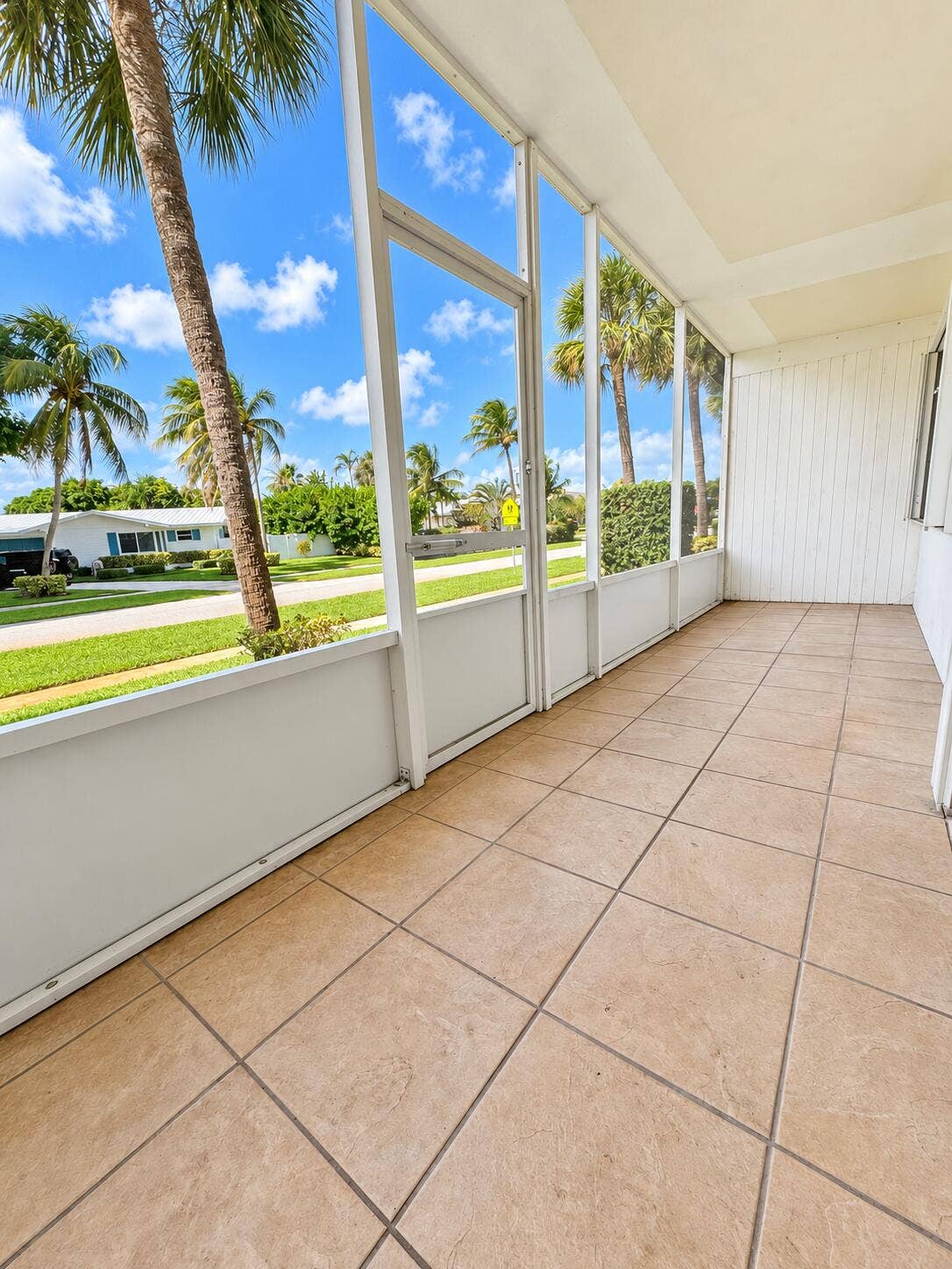 Screened Lanai with Palm Views