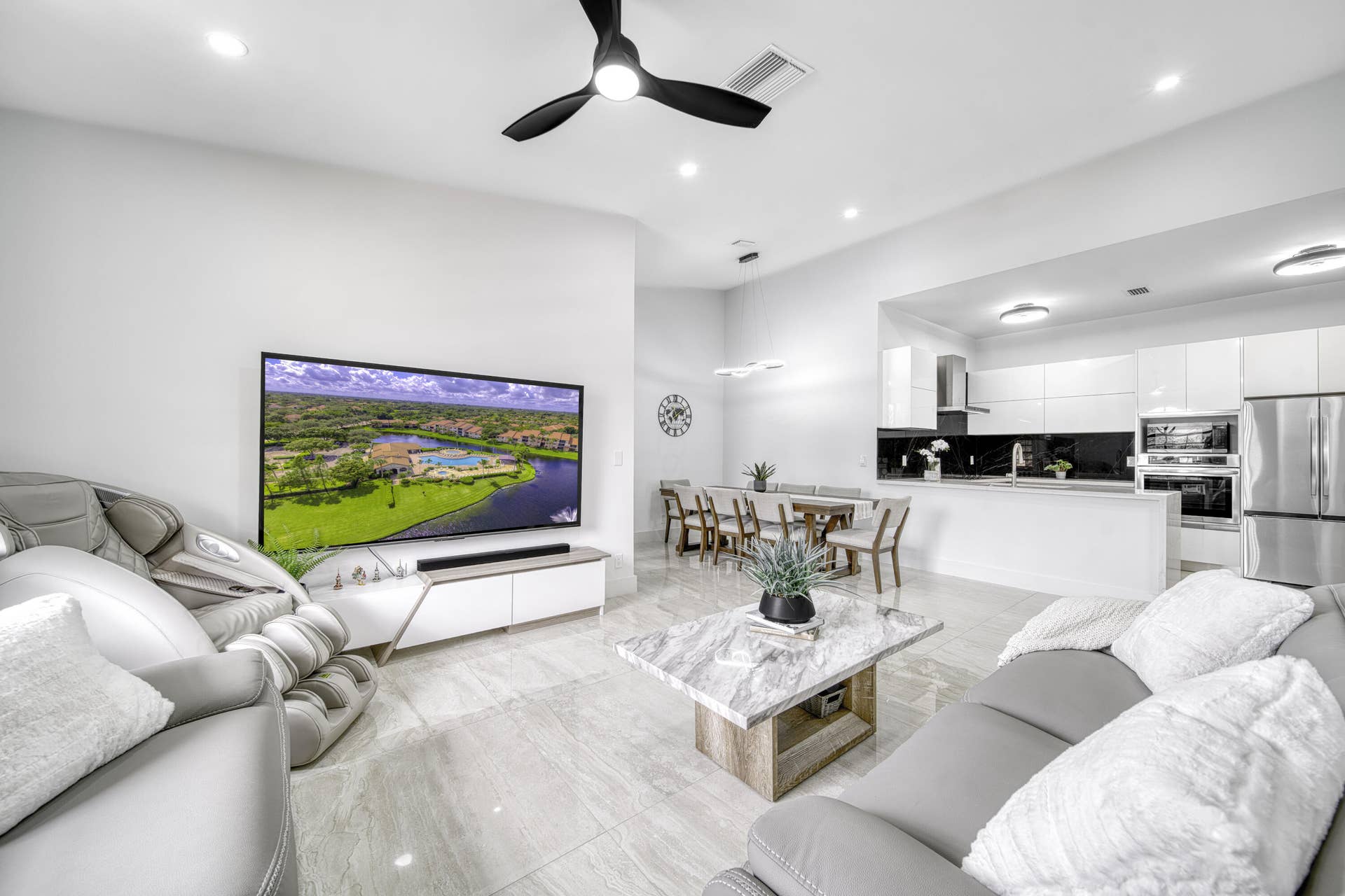 10690 NW 14TH Street, #138, Plantation, FL 33322 Bright, open living area with soaring 14-foot ceilings.