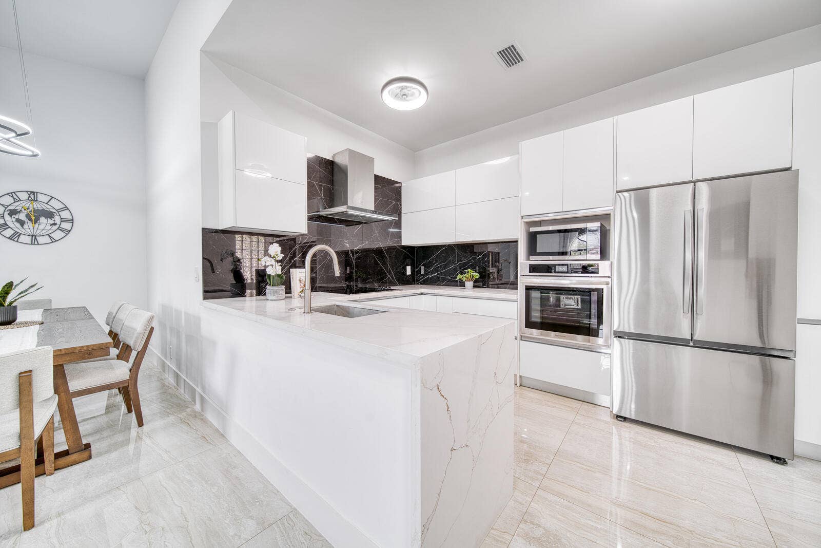 10690 NW 14TH Street, #138, Plantation, FL 33322 Custom Gola-style cabinetry, quartz countertops, and a waterfall island highlight
