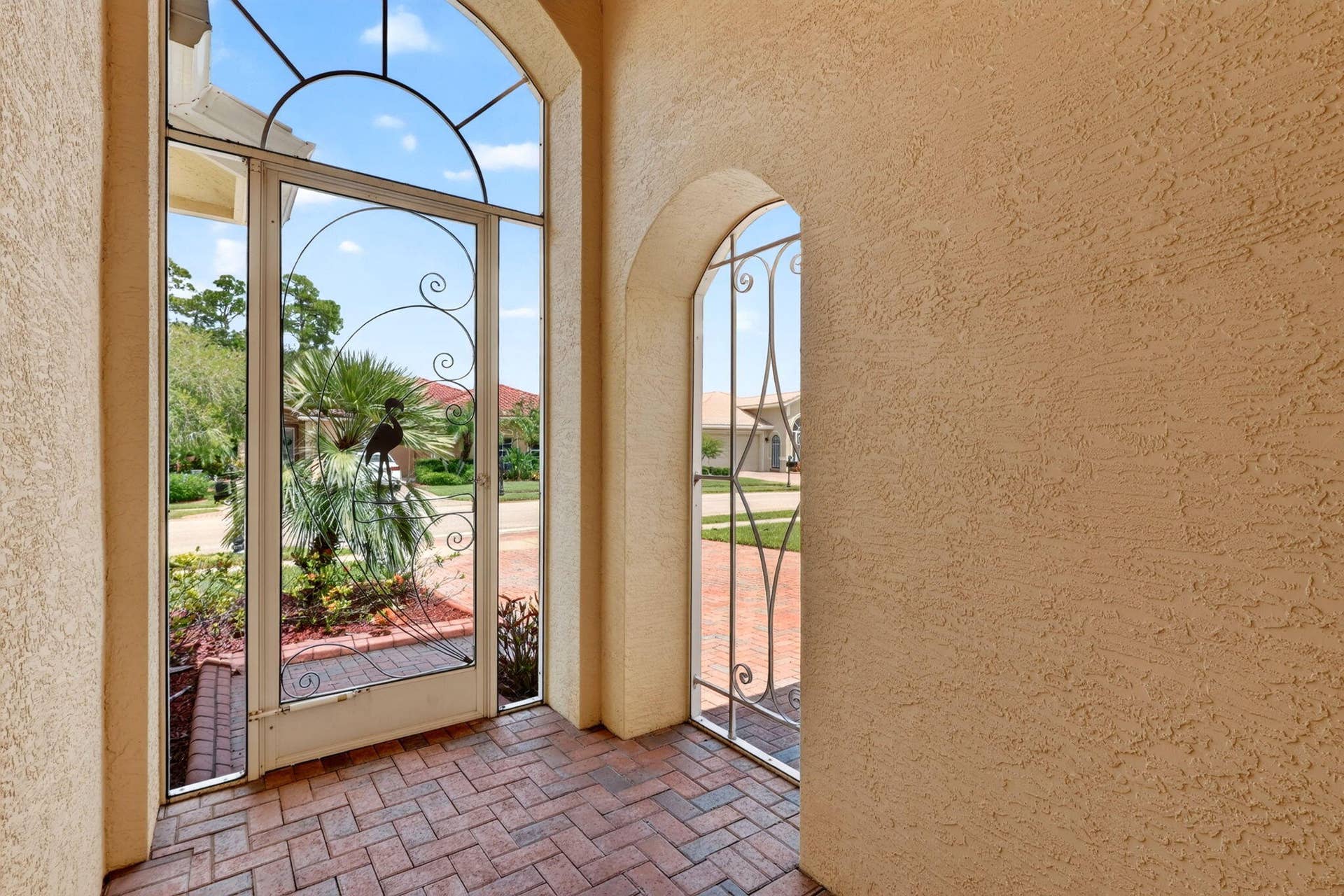 6311 ASTOR Place, Vero Beach, FL 32966 Covered Screend Front Entry
