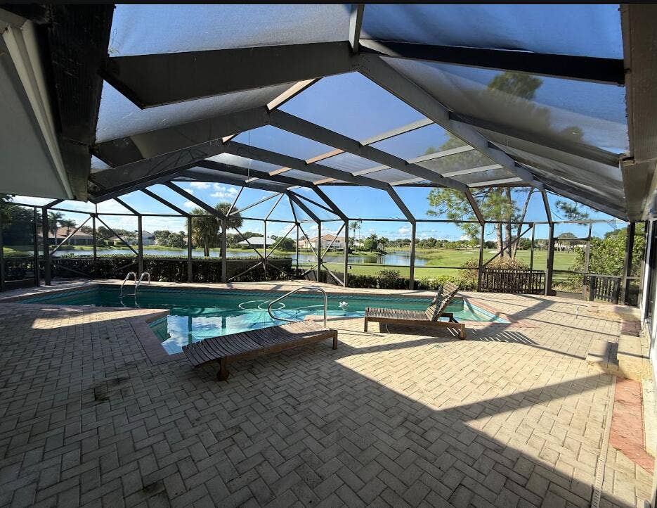 6500 SE WINGED FOOT Drive, Stuart, FL 34997 Pool/Golf Course View