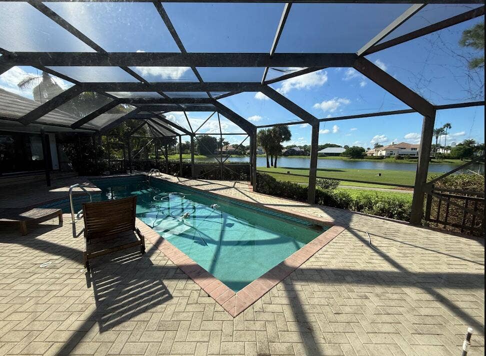 6500 SE WINGED FOOT Drive, Stuart, FL 34997 Pool/Golf Course View