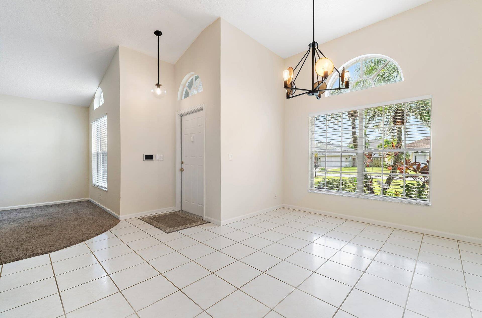 6037 Foster Street, Jupiter, FL 33458 Front entry opening to the dining room.