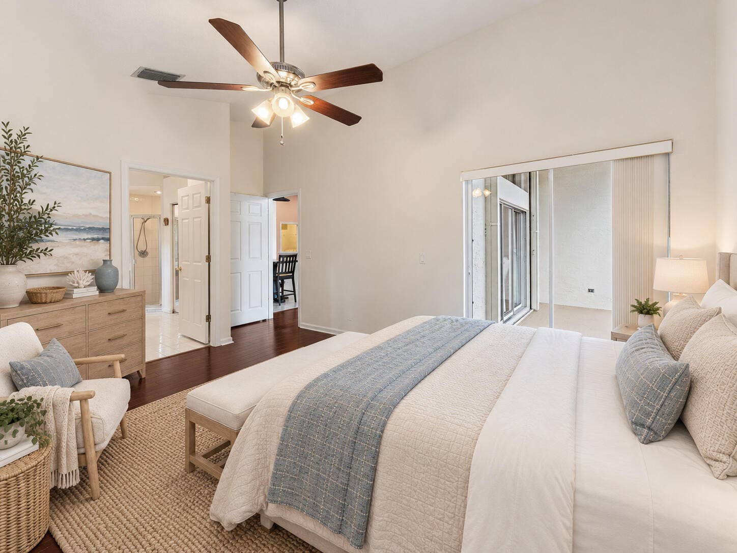 6037 Foster Street, Jupiter, FL 33458 VIRTUALLY STAGED. Primary bedroom shown with digital furniture and decor to illustrate possible updates.