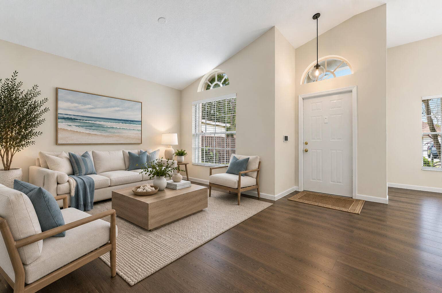 6037 Foster Street, Jupiter, FL 33458 VIRTUALLY STAGED. Living room and entry shown with digital furniture and updated floors to illustrate possible updates.