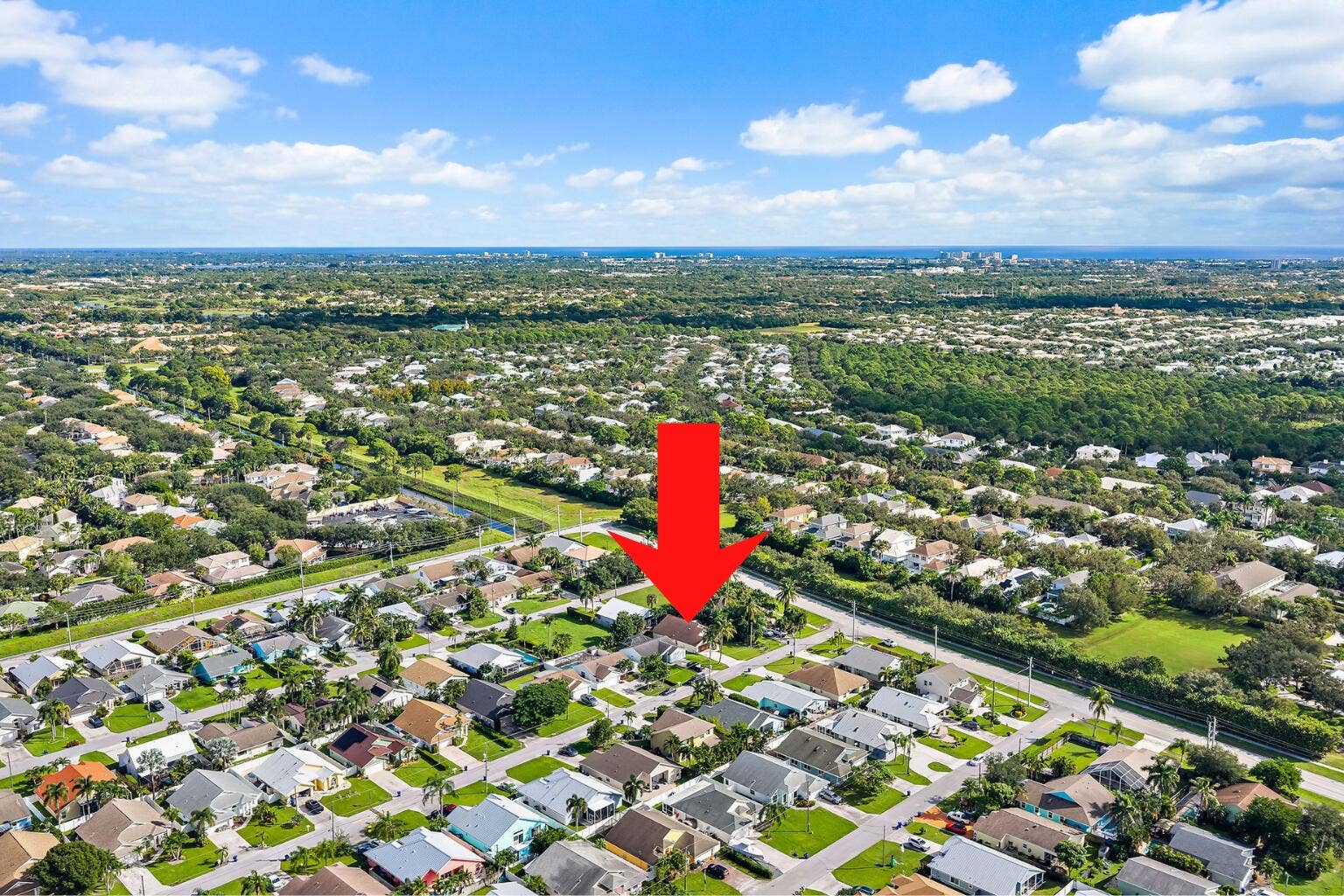 6037 Foster Street, Jupiter, FL 33458 Aerial view with the home marked, in The Heights of Jupiter.
