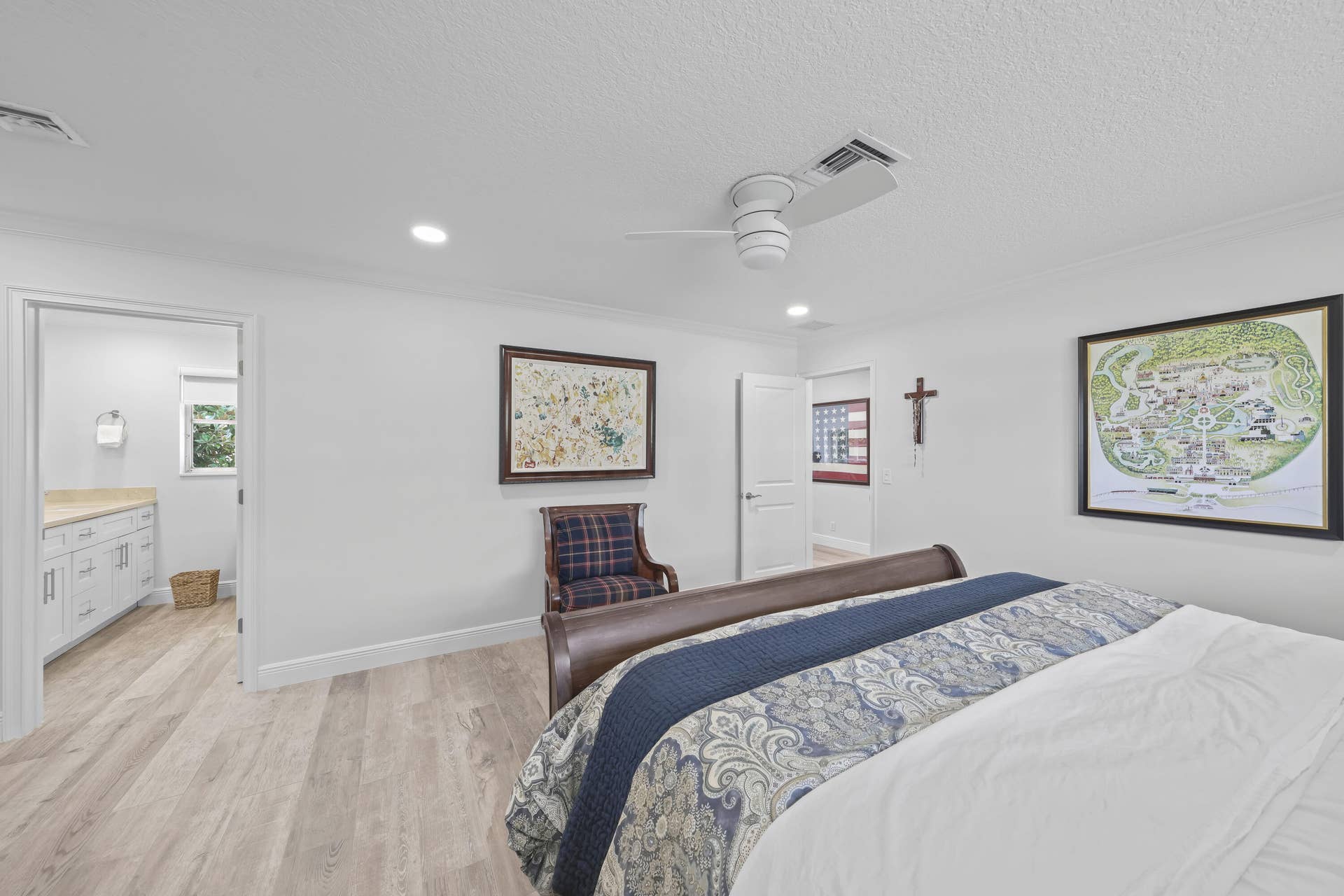 137 Clubhouse Boulevard, Atlantis, FL 33462 Bedroom featuring wood-finish flooring, recessed lighting, and a white ceiling fan