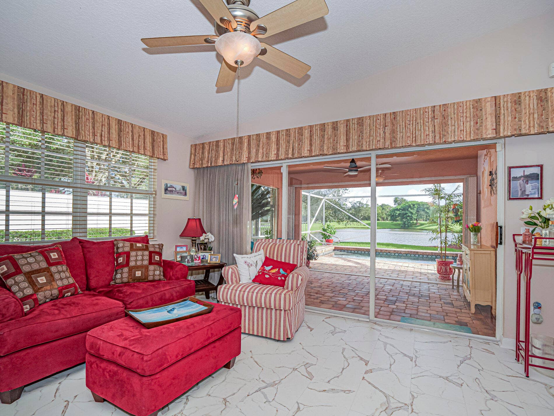 Sliders to the Pool and Screened Lanai