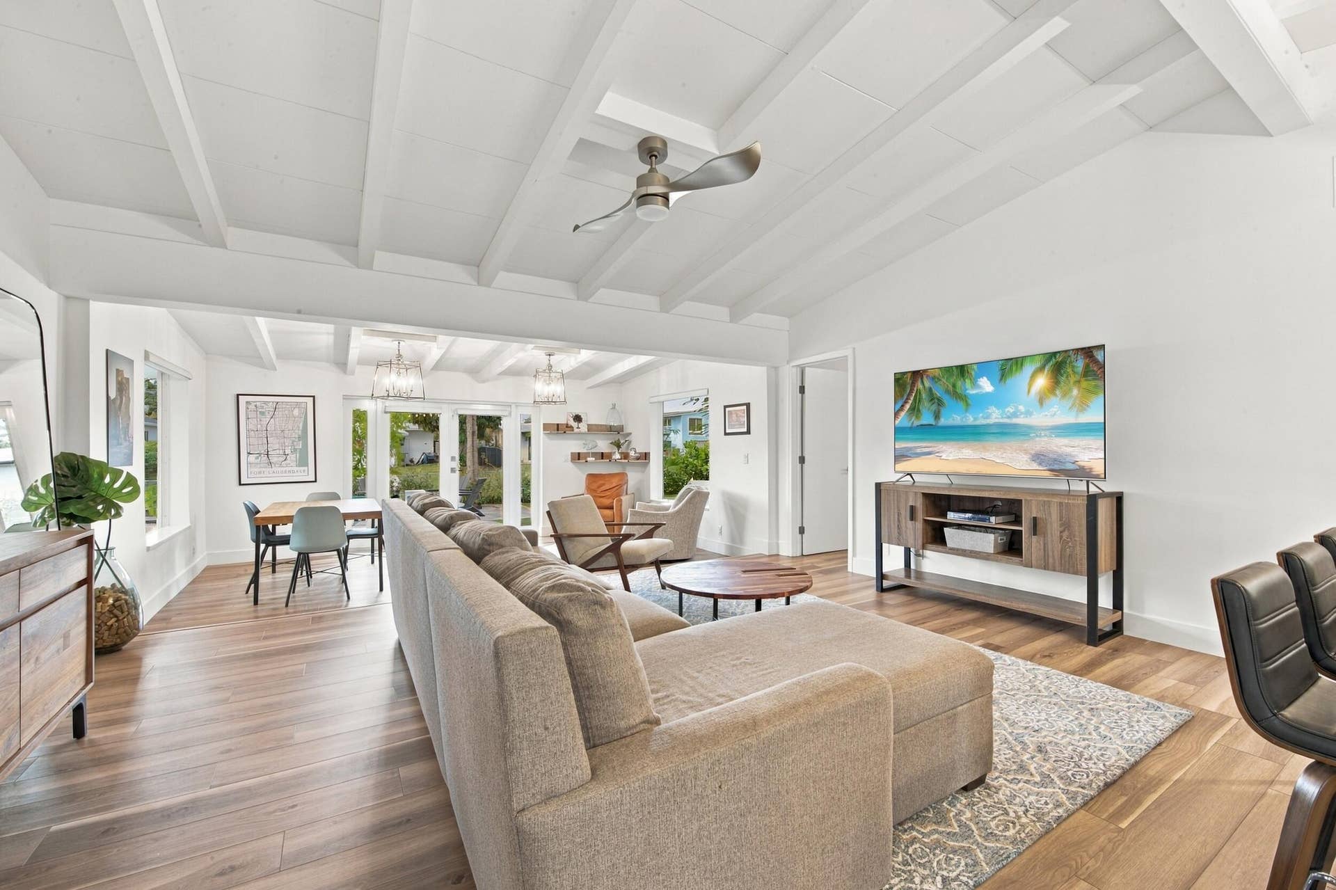 2449 KEY LARGO Lane, Fort Lauderdale, FL 33312 Vaulted ceilings with exposed beams, wood-finish flooring, and recessed lighting