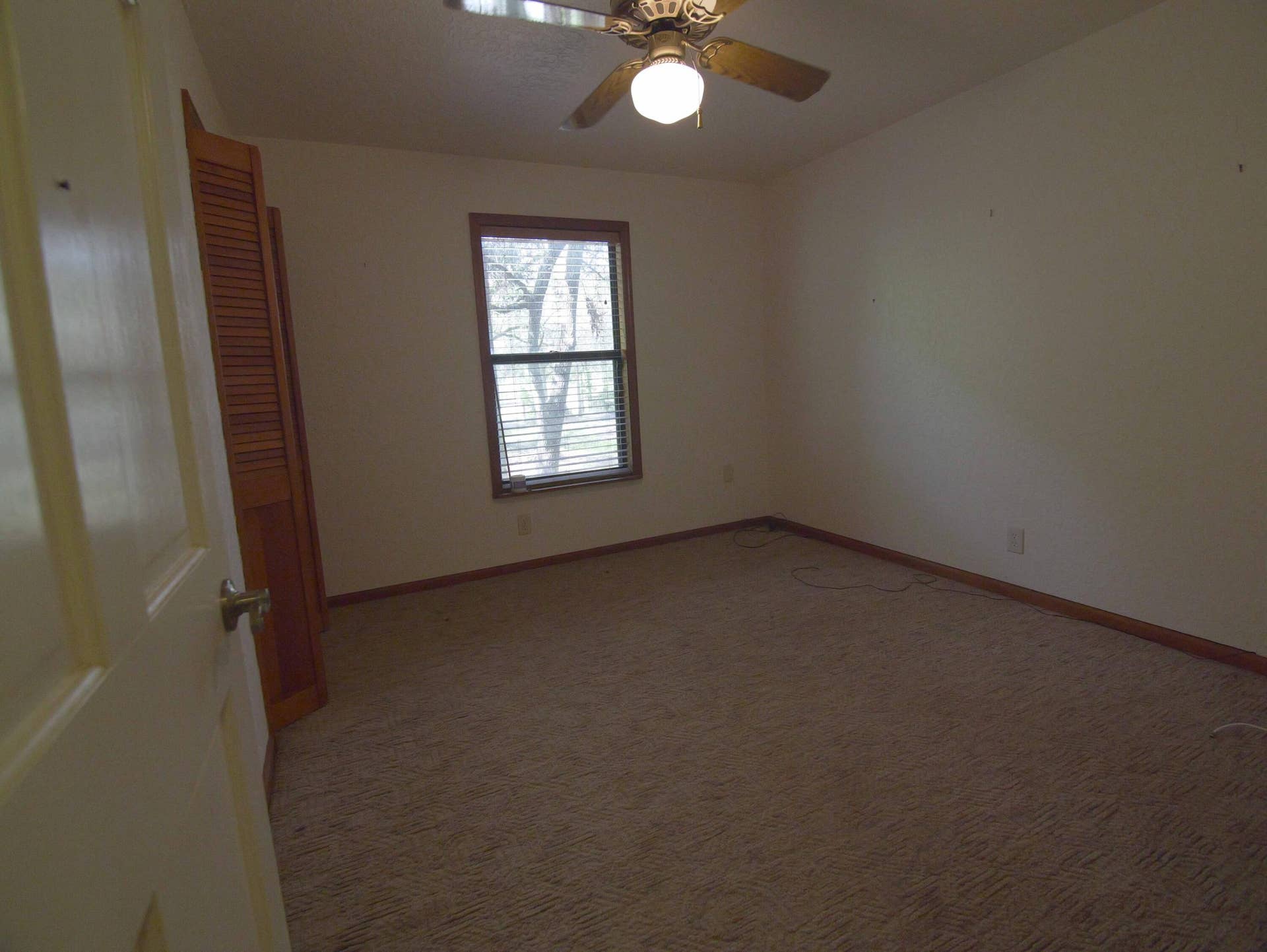 17032 130TH Avenue N, Jupiter, FL 33478 Downstairs Bedroom off entryway
