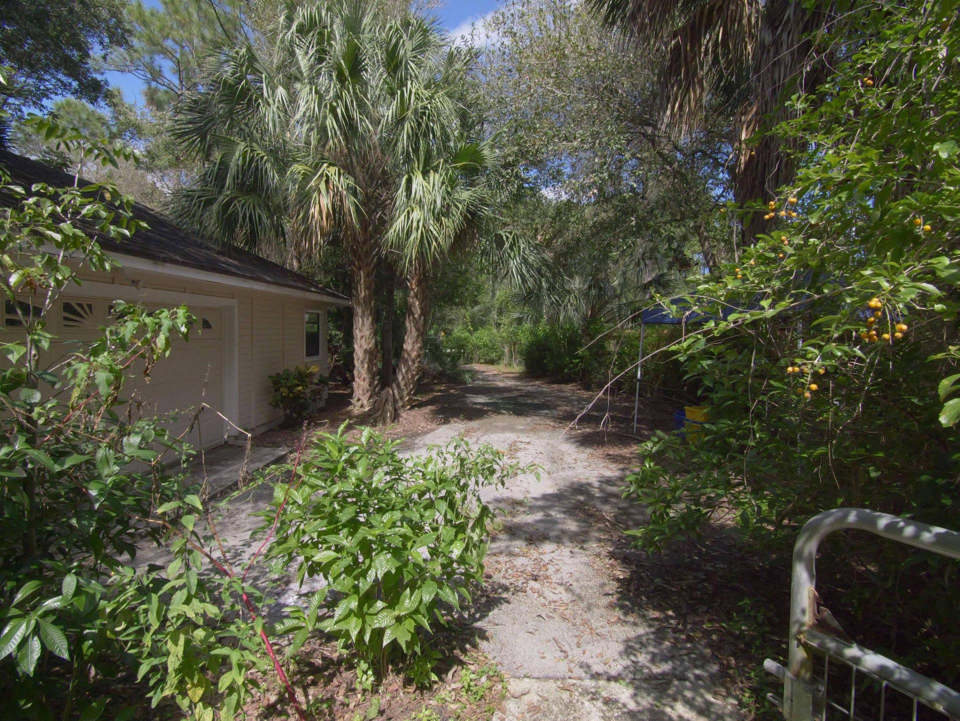 17032 130TH Avenue N, Jupiter, FL 33478 Garage & Drive looking North to 170th