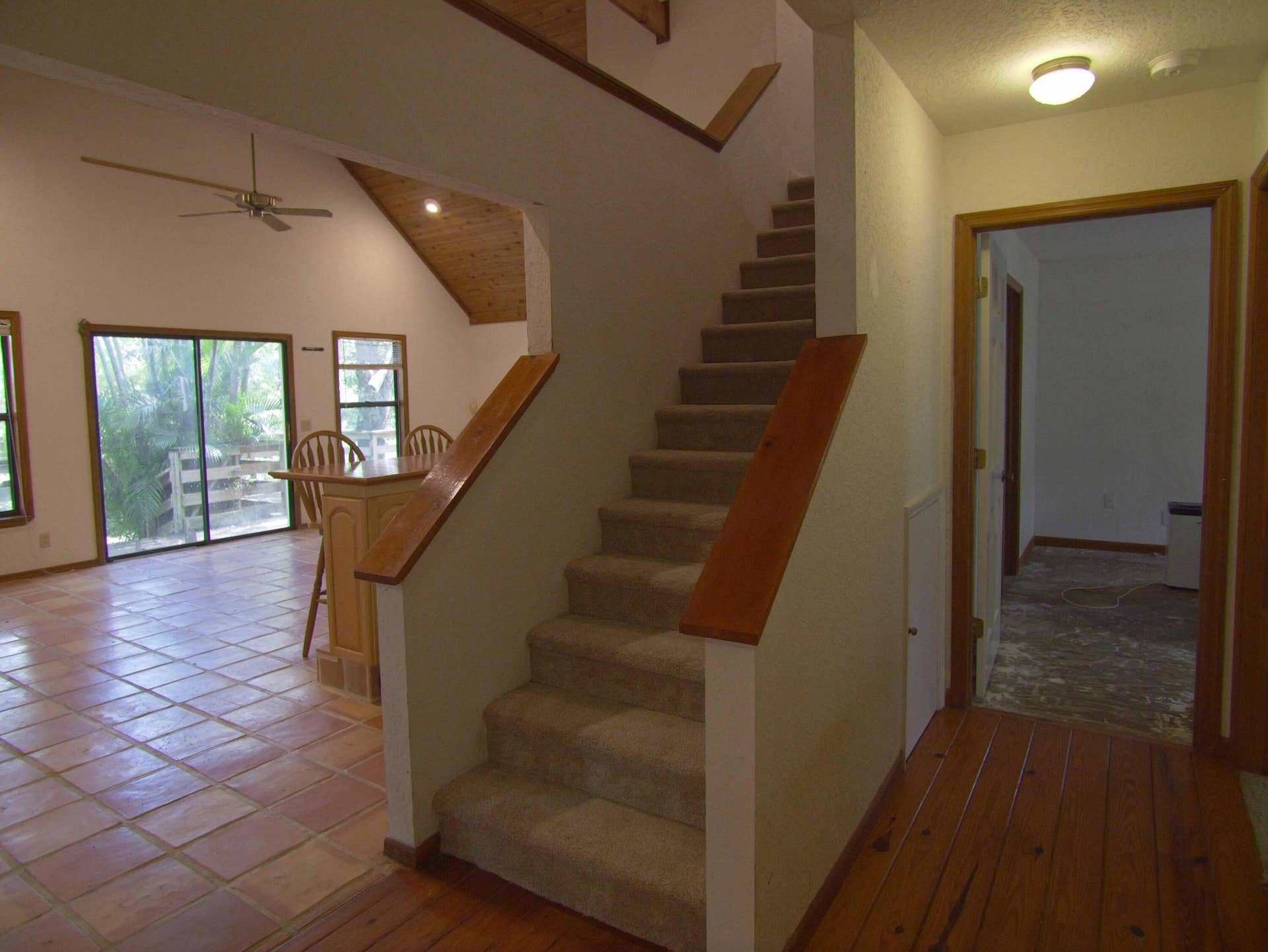 17032 130TH Avenue N, Jupiter, FL 33478 Great Room & Downstairs Primary BDR, leading upstairs