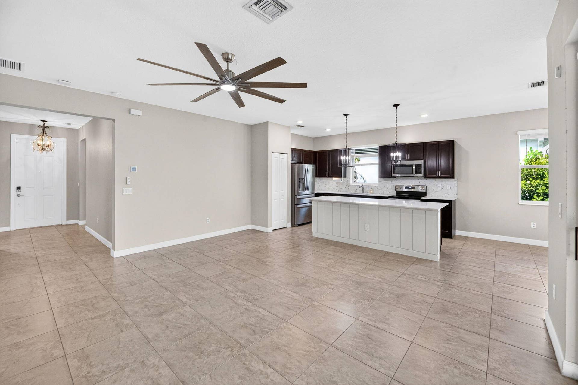 8410 NW GREENBANK Circle, Port St Lucie, FL 34987 32-web-or-mls-Living room 5