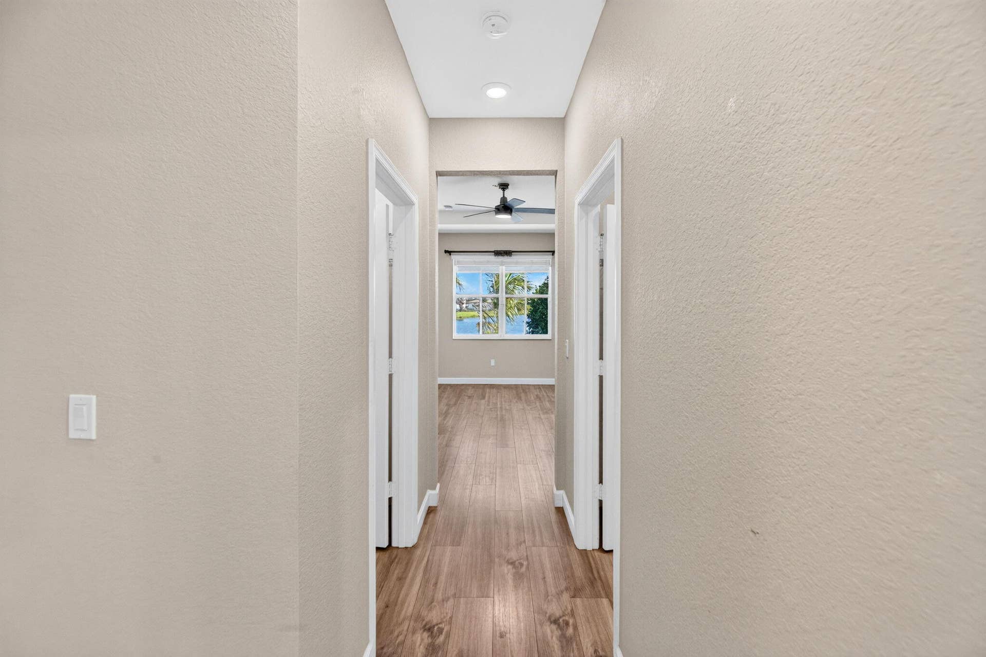 8410 NW GREENBANK Circle, Port St Lucie, FL 34987 35-web-or-mls-Primary bedroom hallway 1