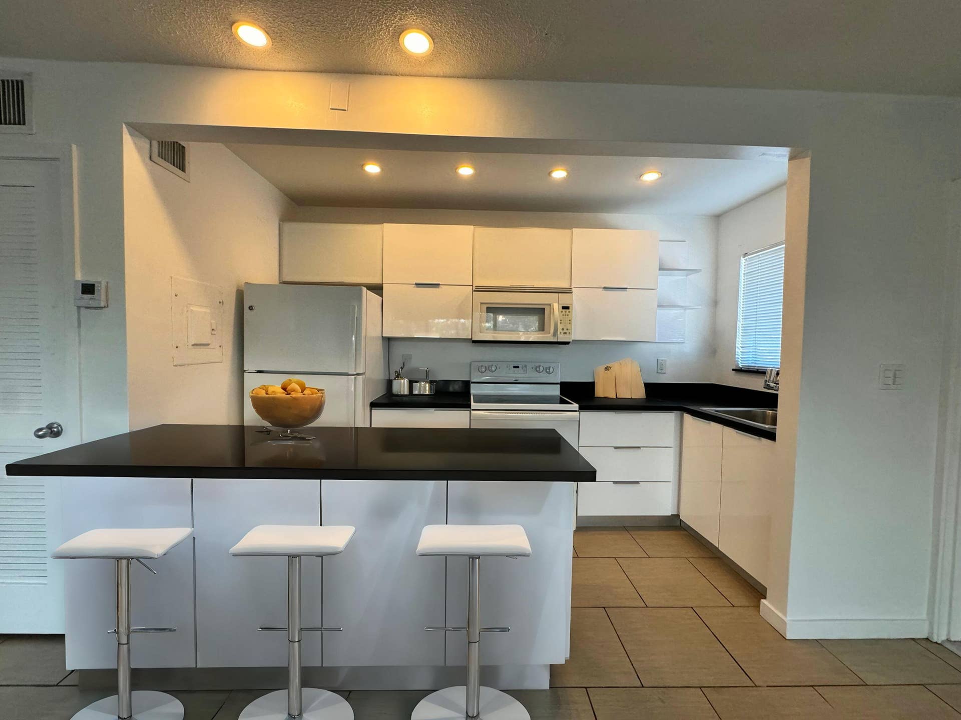 2830 NE 30th Street, #9, Fort Lauderdale, FL 33306 AI - Staged Kitchen