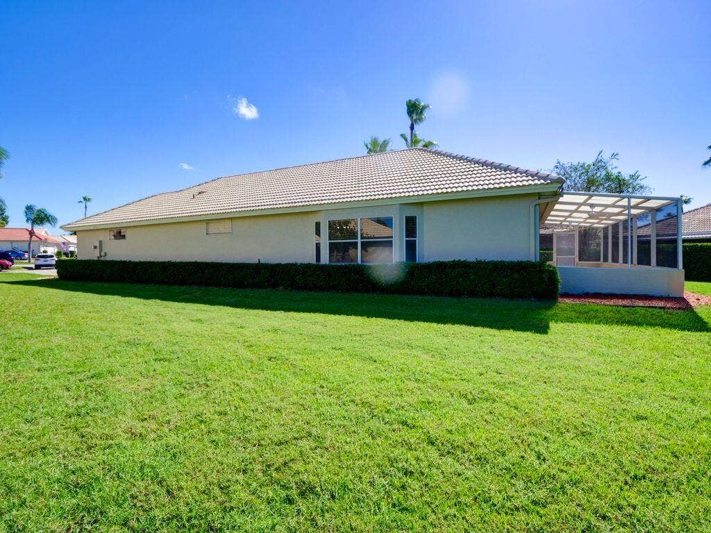 9013 HEATHLAND Court, Mount Dora, FL 32757 9013 Heathland side