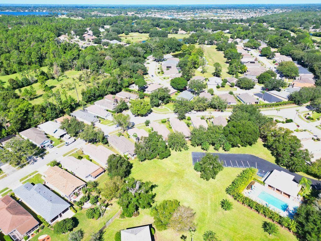 9013 HEATHLAND Court, Mount Dora, FL 32757 9013 Heathland aerial community pool