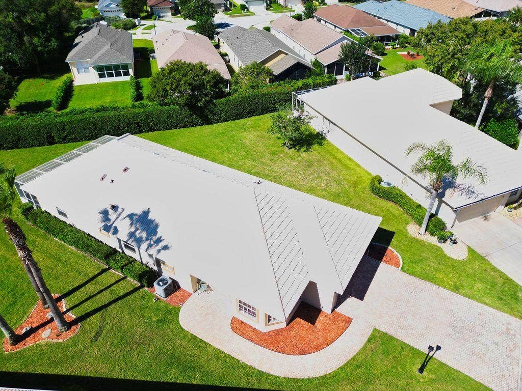 9013 HEATHLAND Court, Mount Dora, FL 32757 9013 Heathland aerial side 1