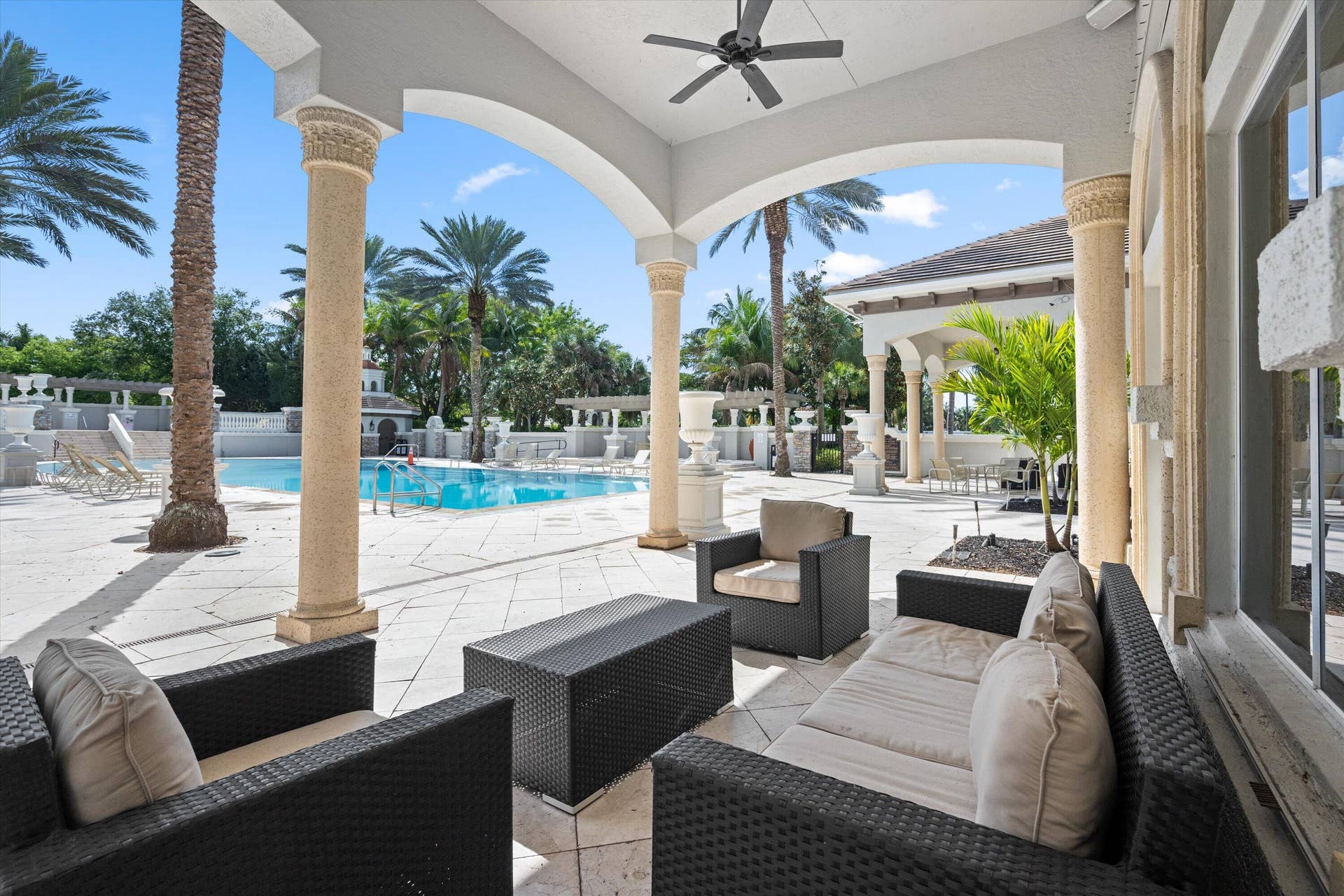 10586 Versailles Boulevard, Wellington, FL 33449 Relax by The Clubhouse Pool