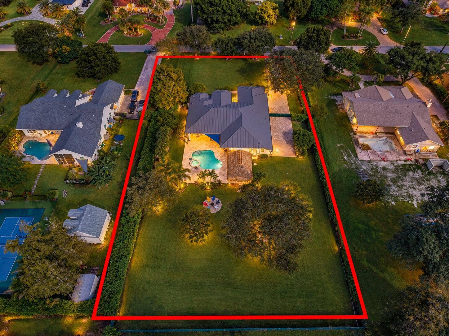 Twilight Aerial Home With Red Property O