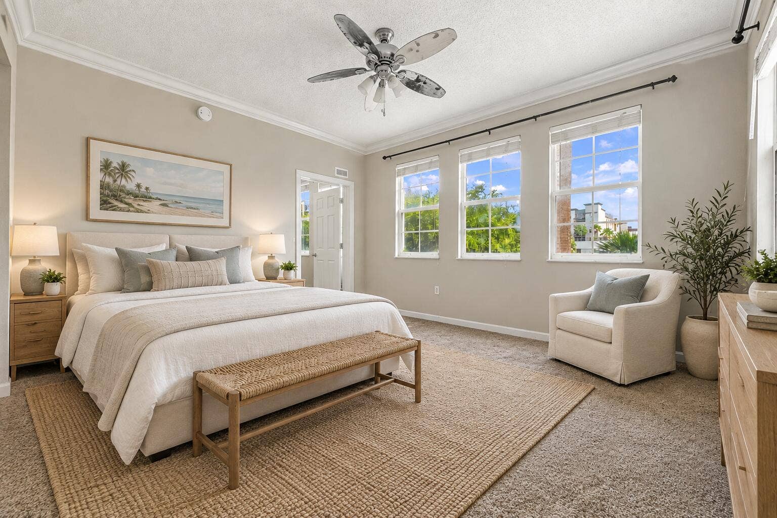 533 NE 3RD Avenue, #202, Fort Lauderdale, FL 33301 Bedroom featuring neutral walls, triple-pane windows with muntins, and a ceiling fan with integrated lighting