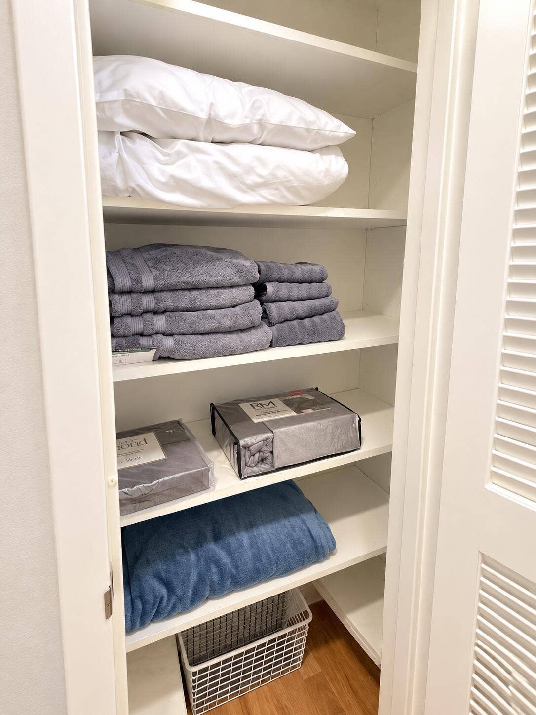 2030 S OCEAN Drive, #211, Hallandale Beach, FL 33009 Organized Linen Closet with Blue Blanket