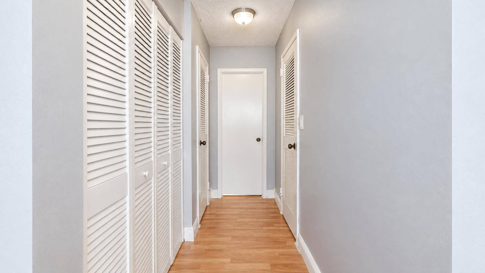 2030 S OCEAN Drive, #211, Hallandale Beach, FL 33009 Bright Gray Hallway with Louvered Closet