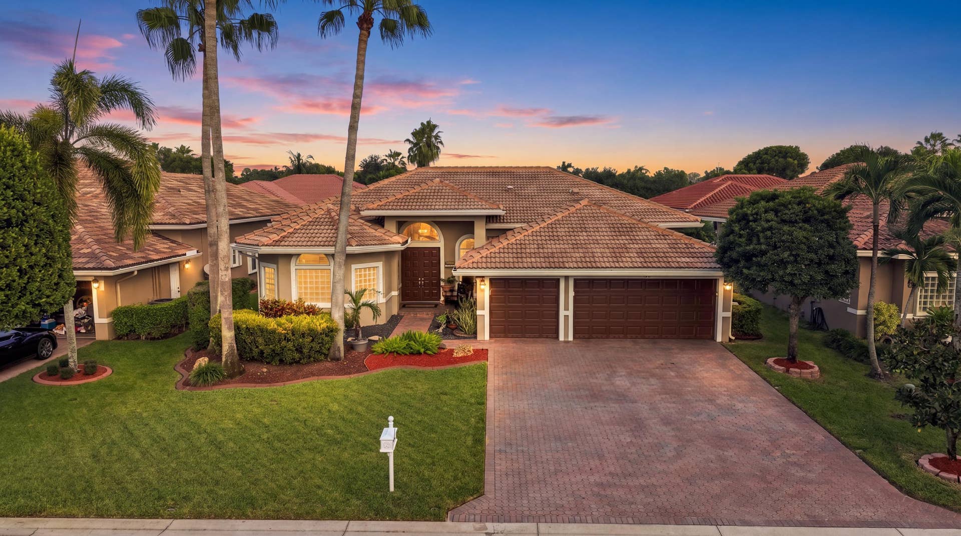 5115 NW 125th Avenue, Coral Springs, FL 33076 Twilight Front Exterior
