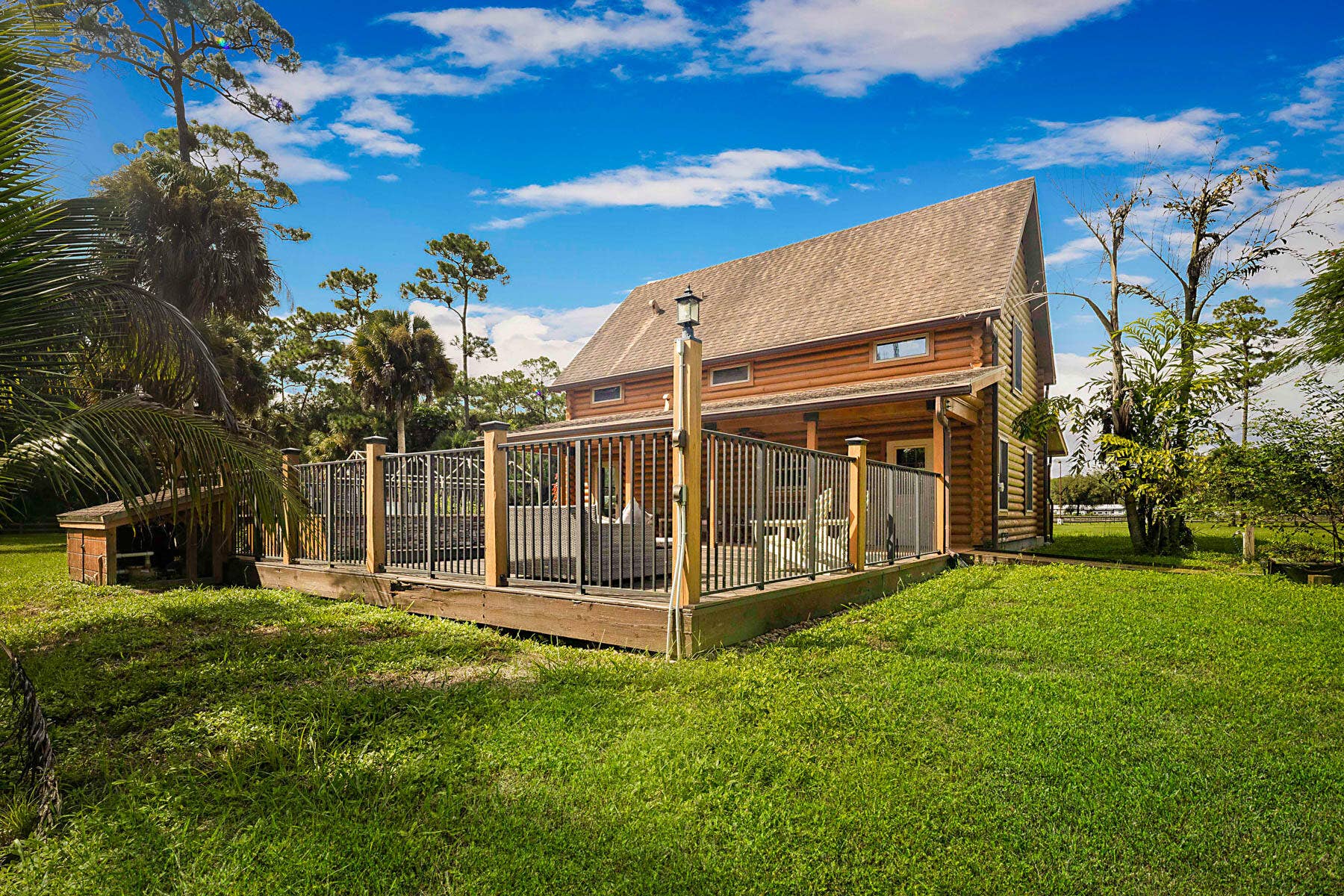 14594 GRUBER Lane, Loxahatchee Groves, FL 33470 BACK OF LOG CABIN