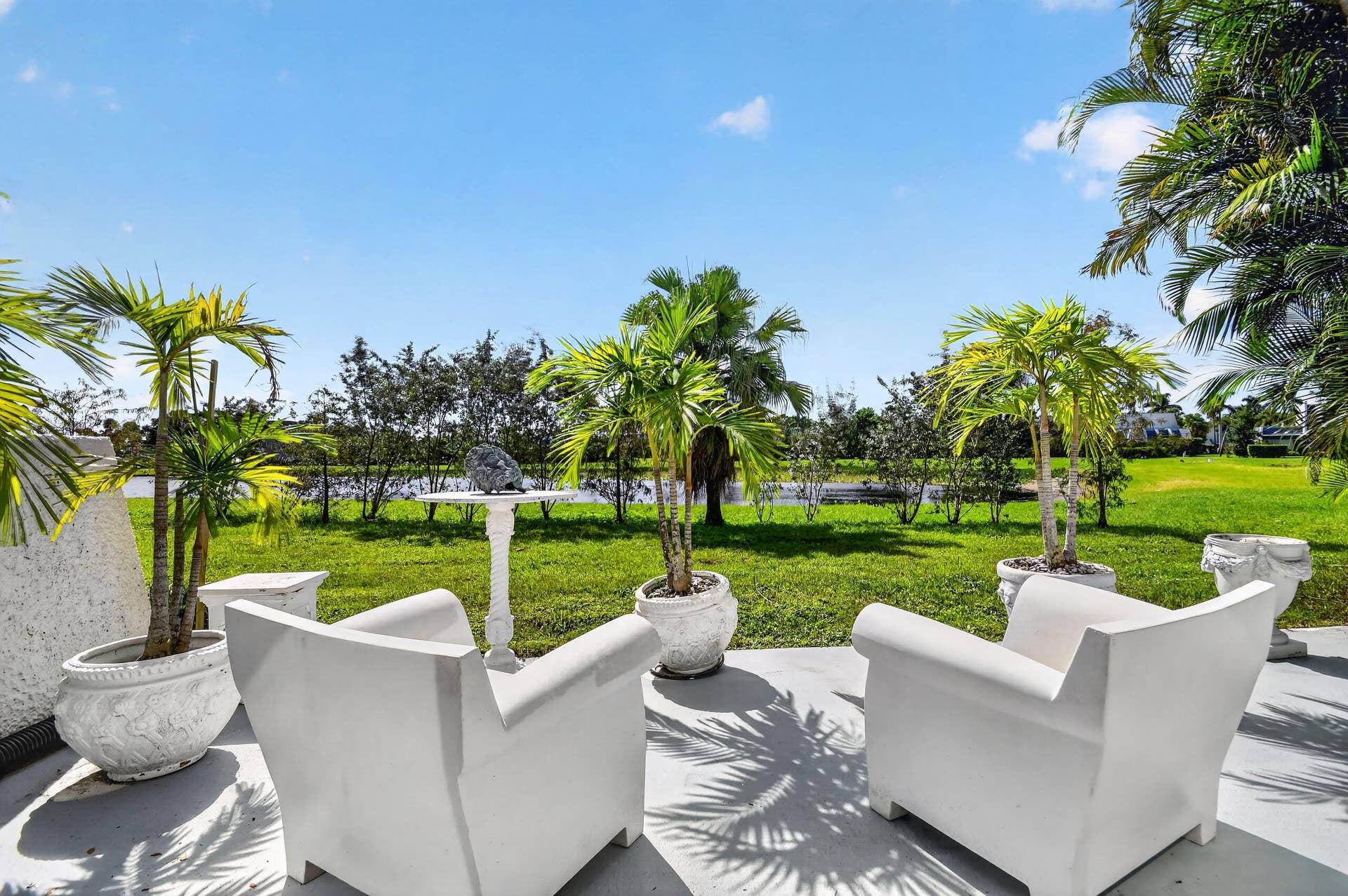 4280 DESTE Court, Lake Worth, FL 33467 Outside patio with water view.