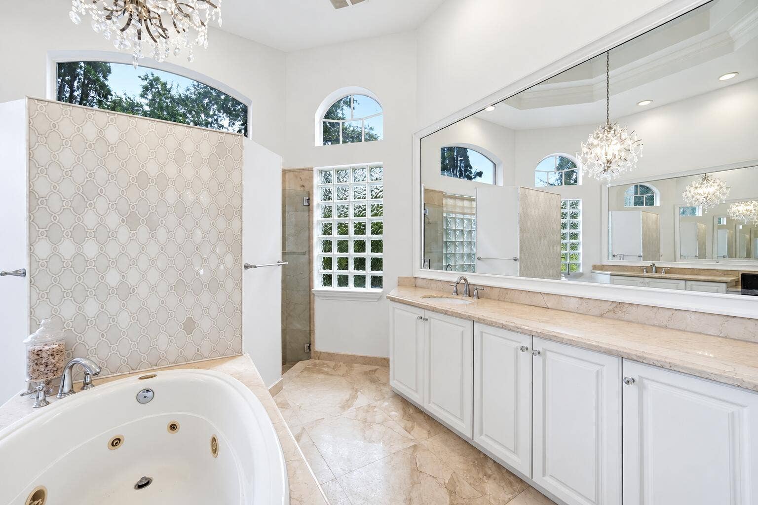 Luxury Bathroom with Arched Windows
