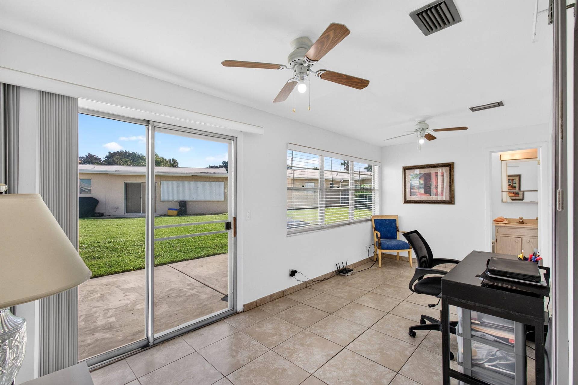 2703 Peer Lane, Delray Beach, FL 33445 Enclosed patio - enlarged sqft compared to what is shown.