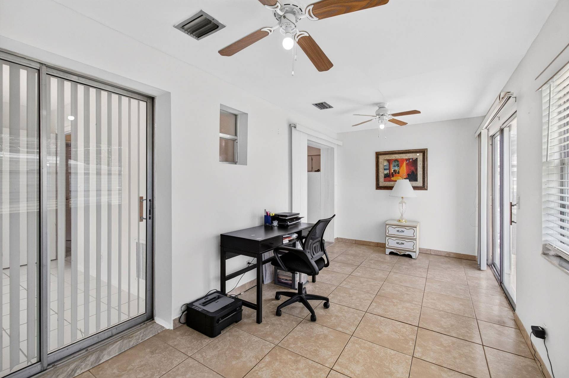 2703 Peer Lane, Delray Beach, FL 33445 Enclosed patio - enlarged sqft compared to what is shown.