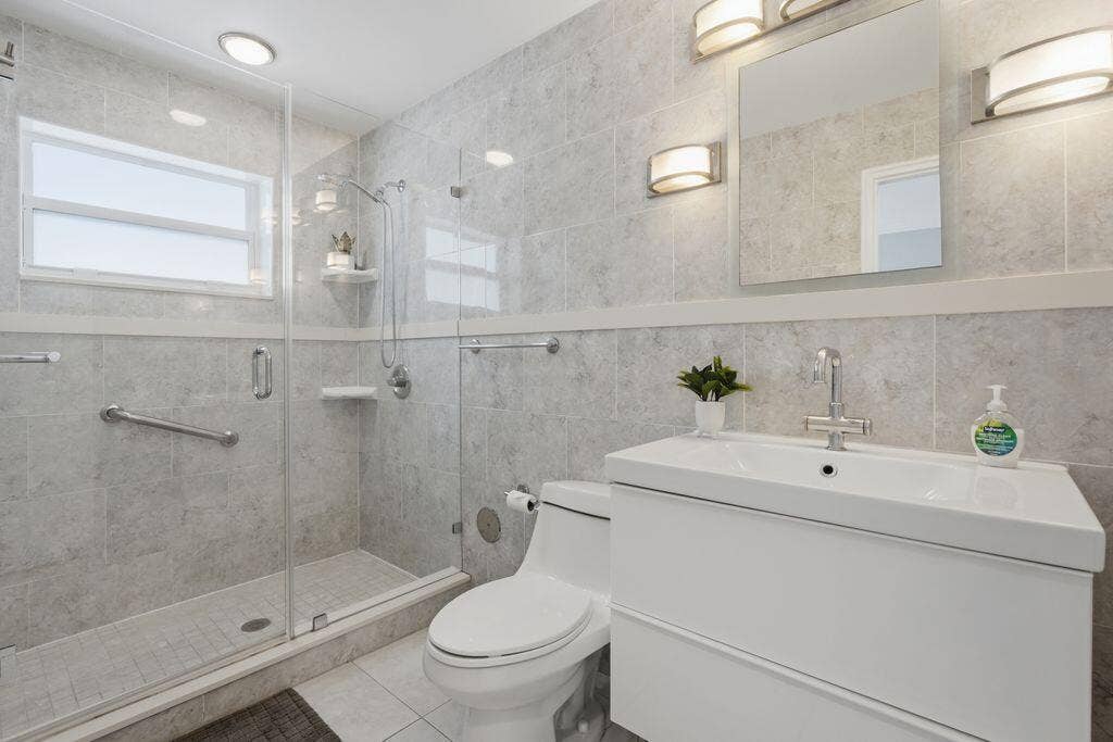 315 VAN BUREN Street, #205B, Hollywood, FL 33019 ALL TILED BATH WITH LARGE STEP IN SHOWER-GLASS DOOR