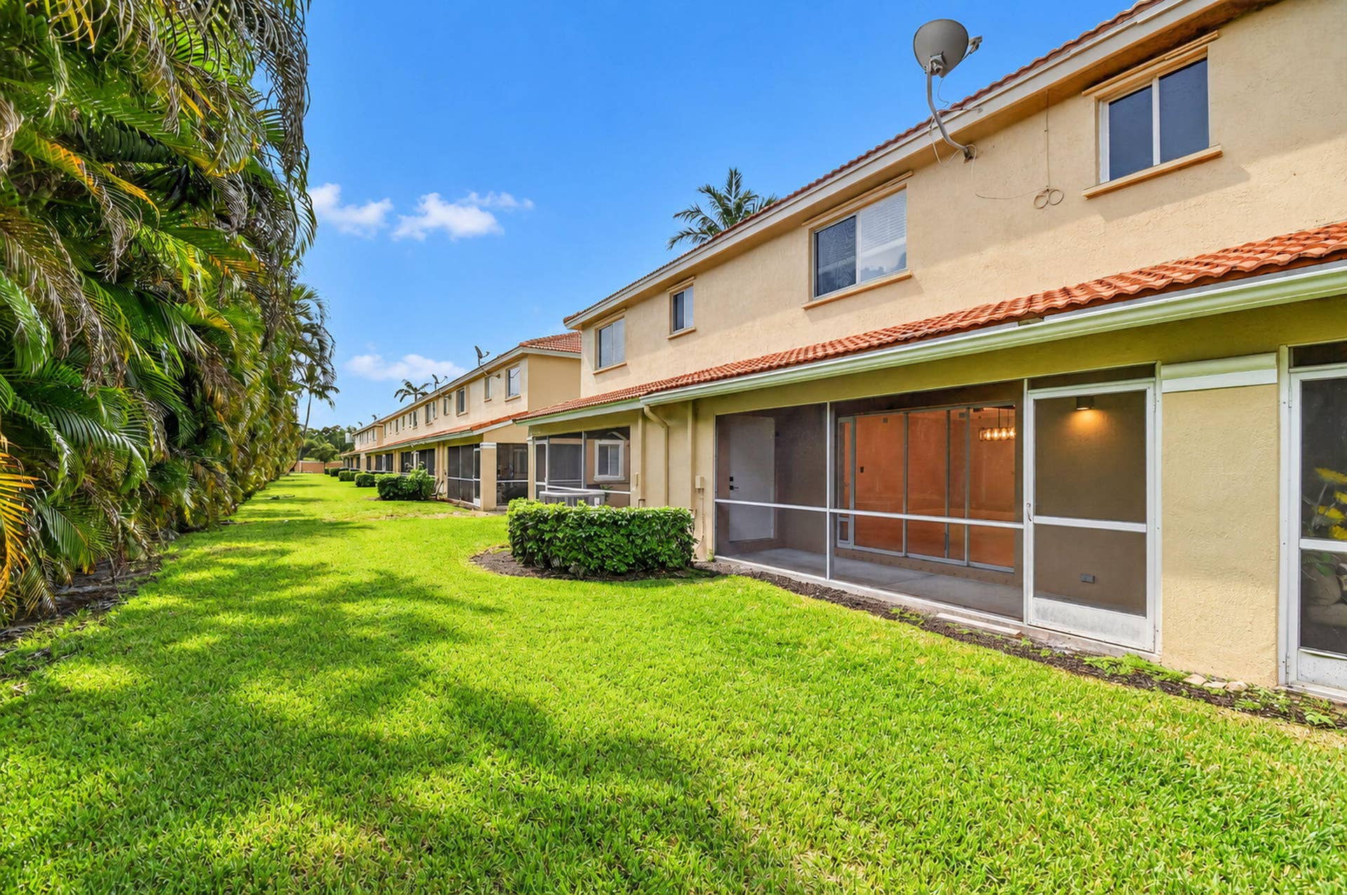 6143 Whalton Street, West Palm Beach, FL 33411 Rear patio with storage. (Currently holds full set of hurricane impact panels)