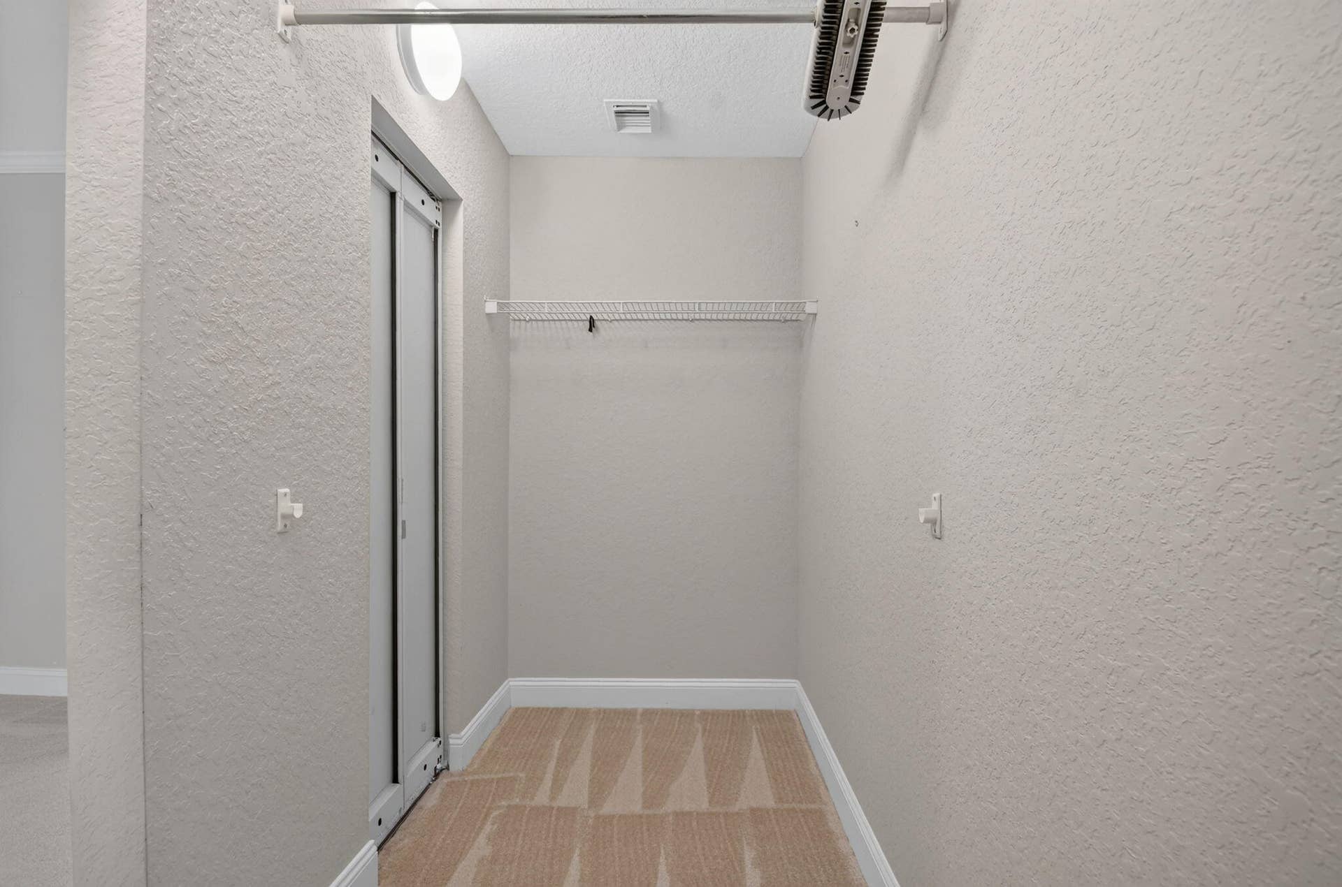 6143 Whalton Street, West Palm Beach, FL 33411 Master closet w/attic access