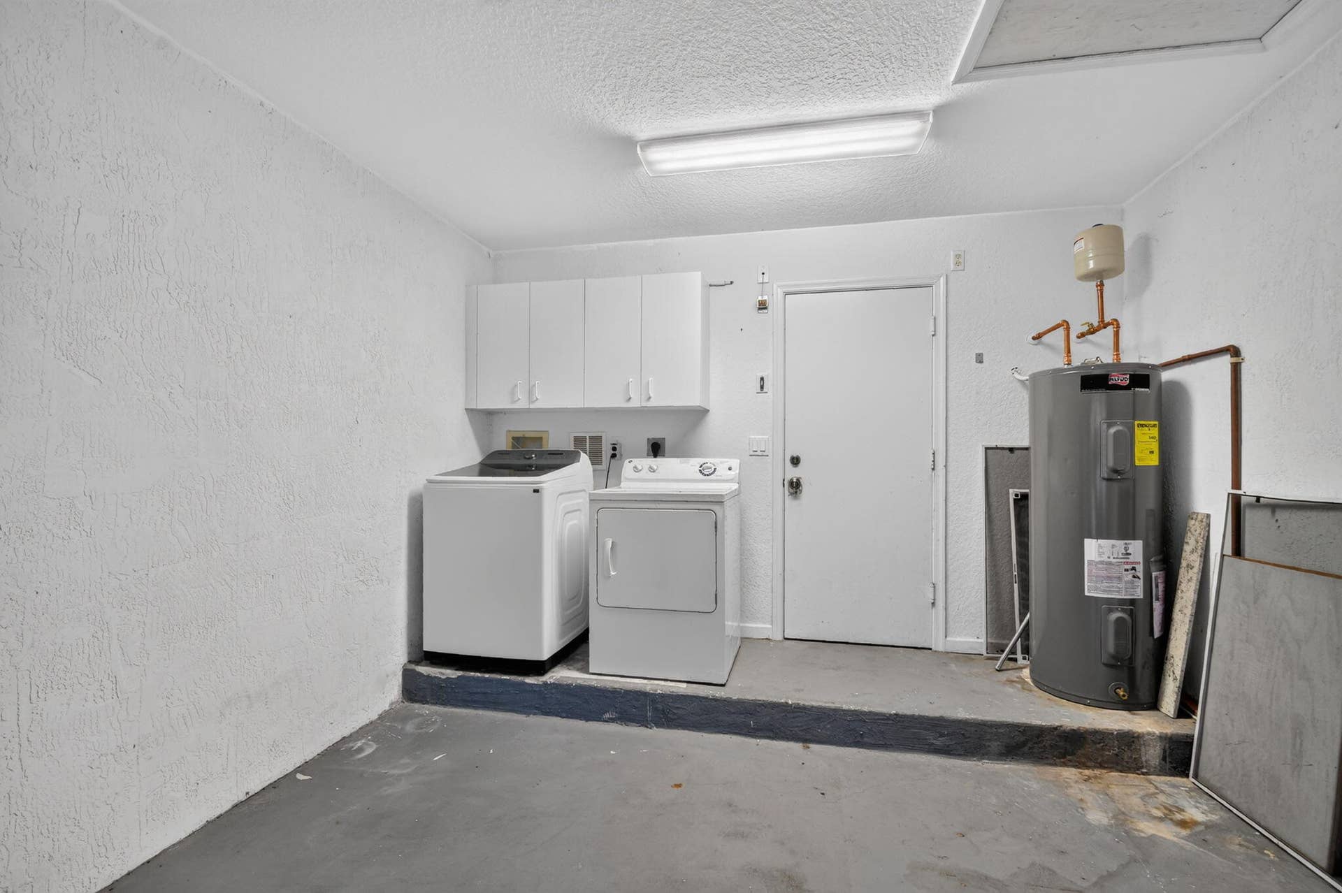 6143 Whalton Street, West Palm Beach, FL 33411 50 gallon electric water heater with 6 year warranty installed 4/24. Storage through attic access.