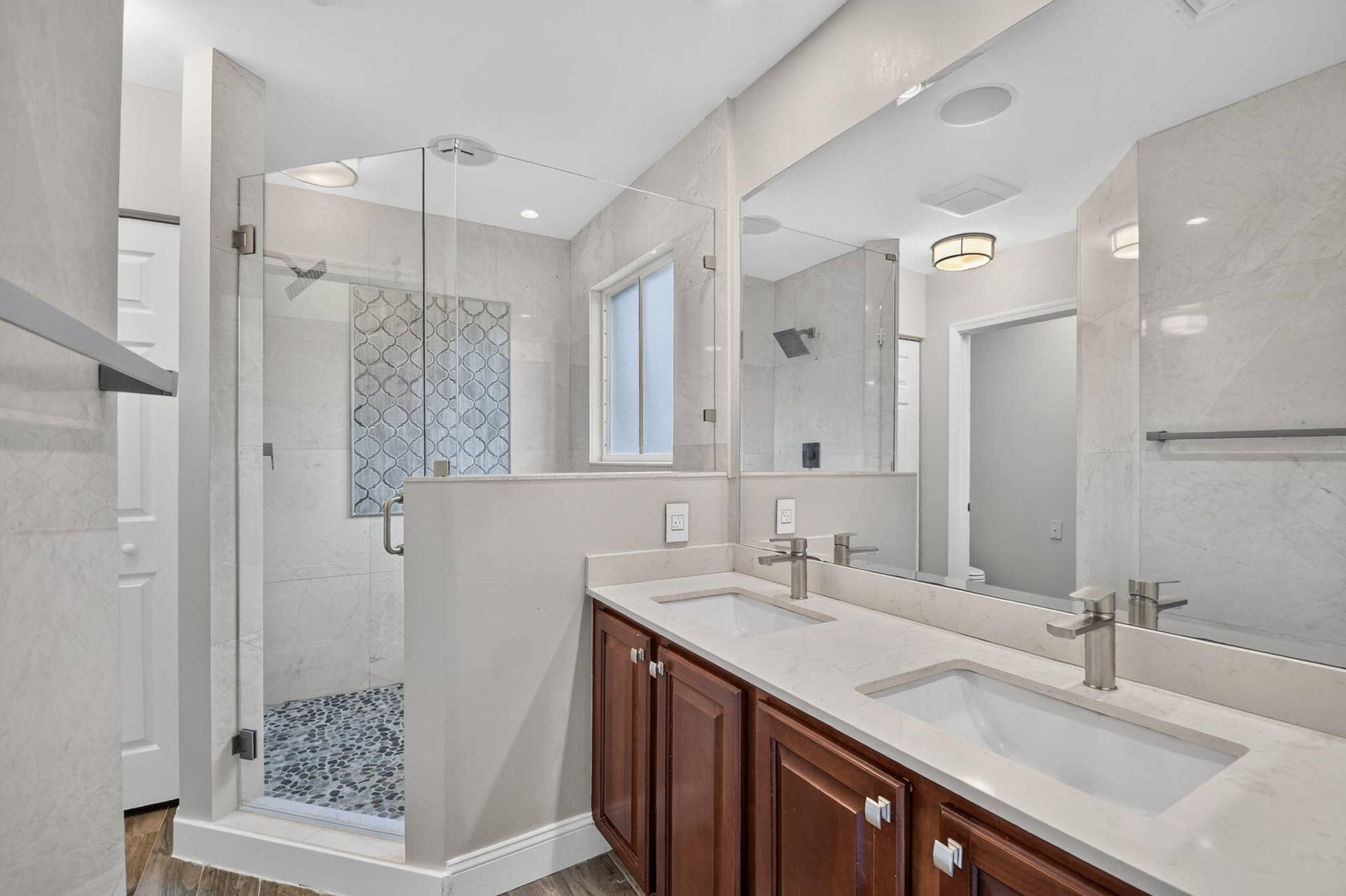 6143 Whalton Street, West Palm Beach, FL 33411 River rock shower floor and built in shelving. Ceiling speakers wired to head unit. (Not shown)
