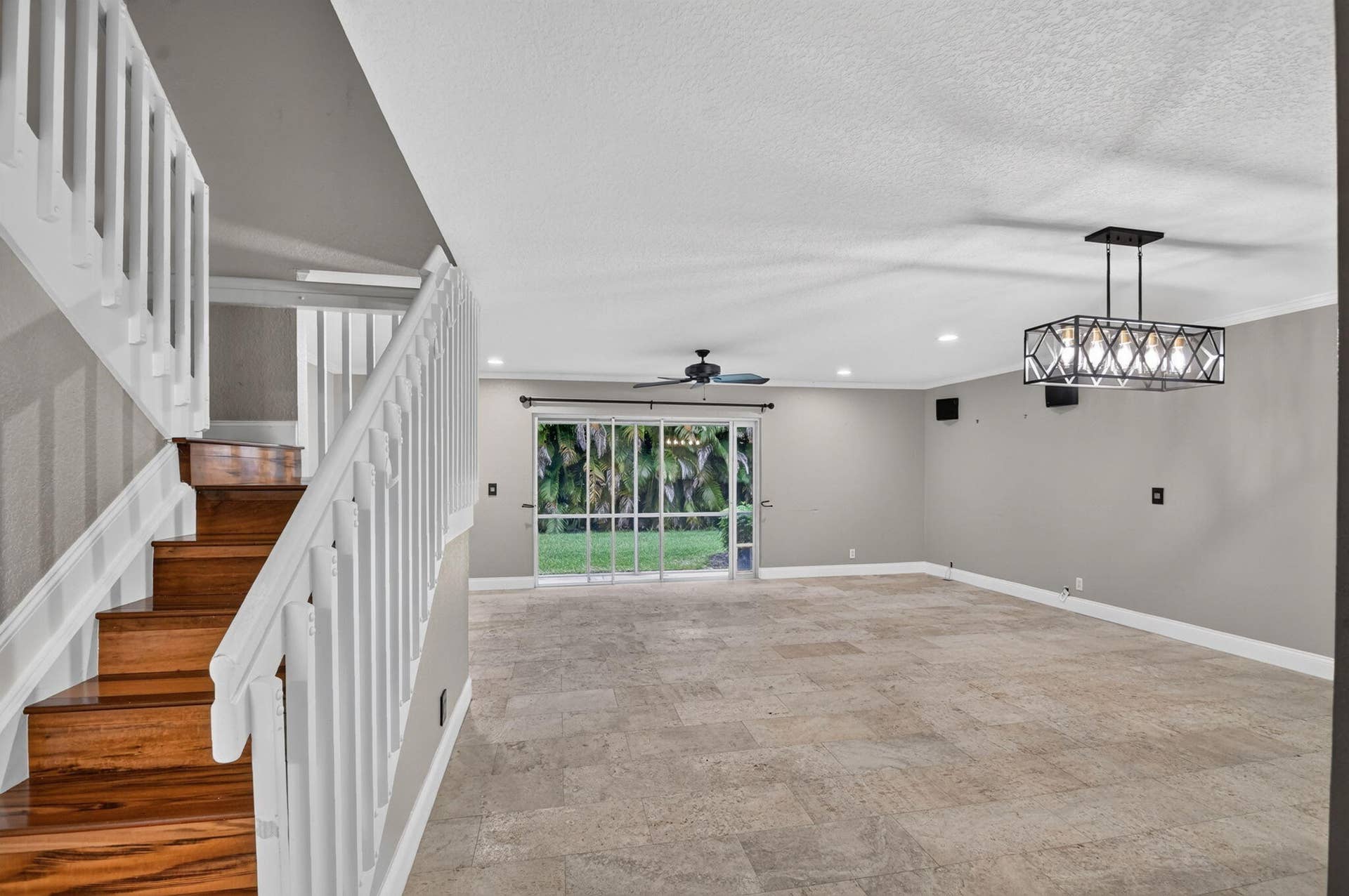 6143 Whalton Street, West Palm Beach, FL 33411 Travertine floors throughout first floor