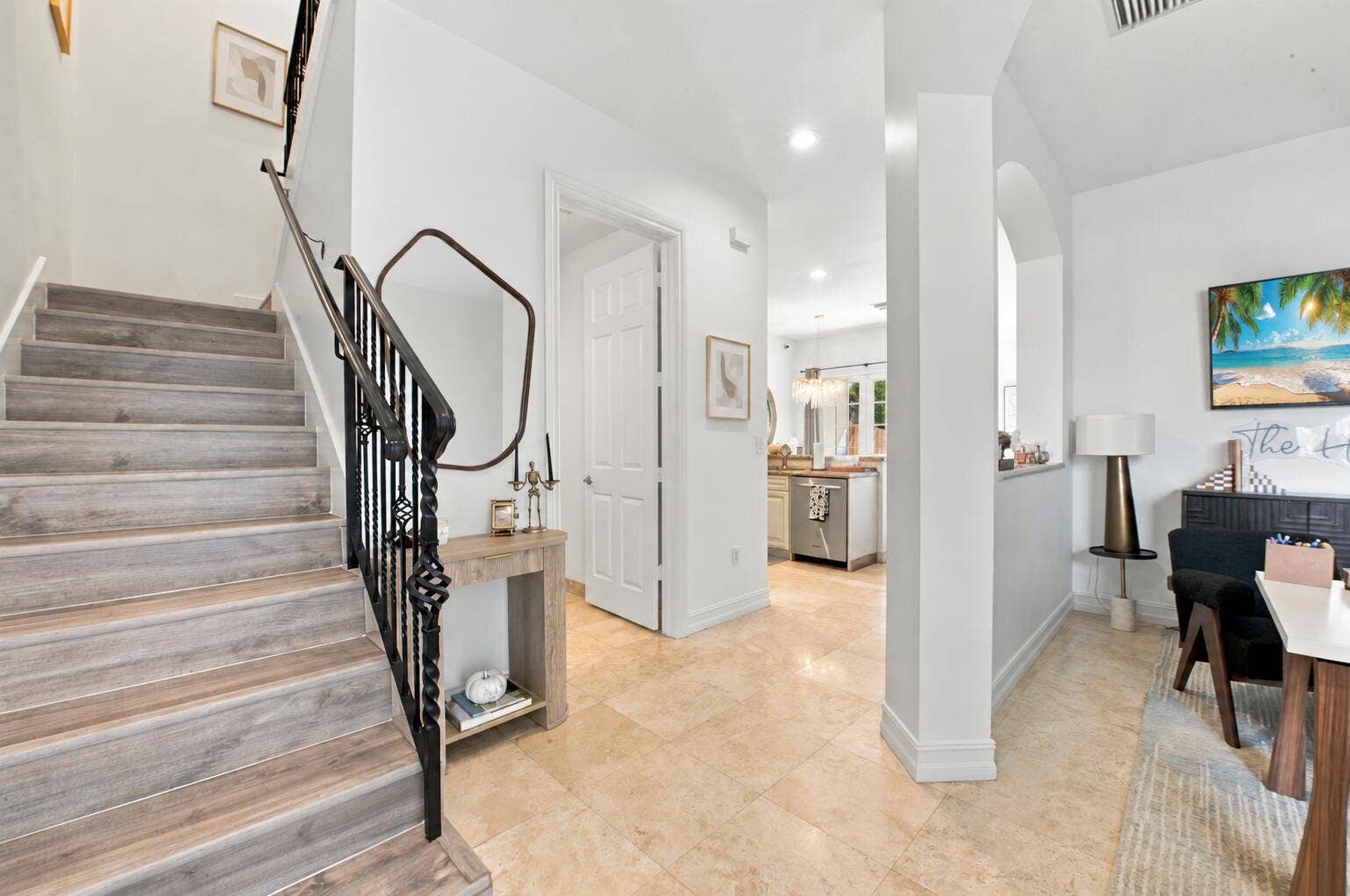 1752 NE 12TH Street, Fort Lauderdale, FL 33304 Neutral abstract art refreshes the stair