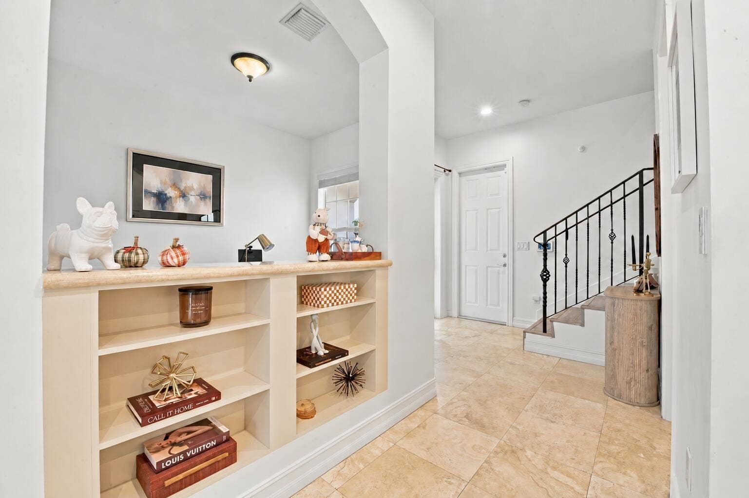 1752 NE 12TH Street, Fort Lauderdale, FL 33304 Contemporary abstract art above built-in