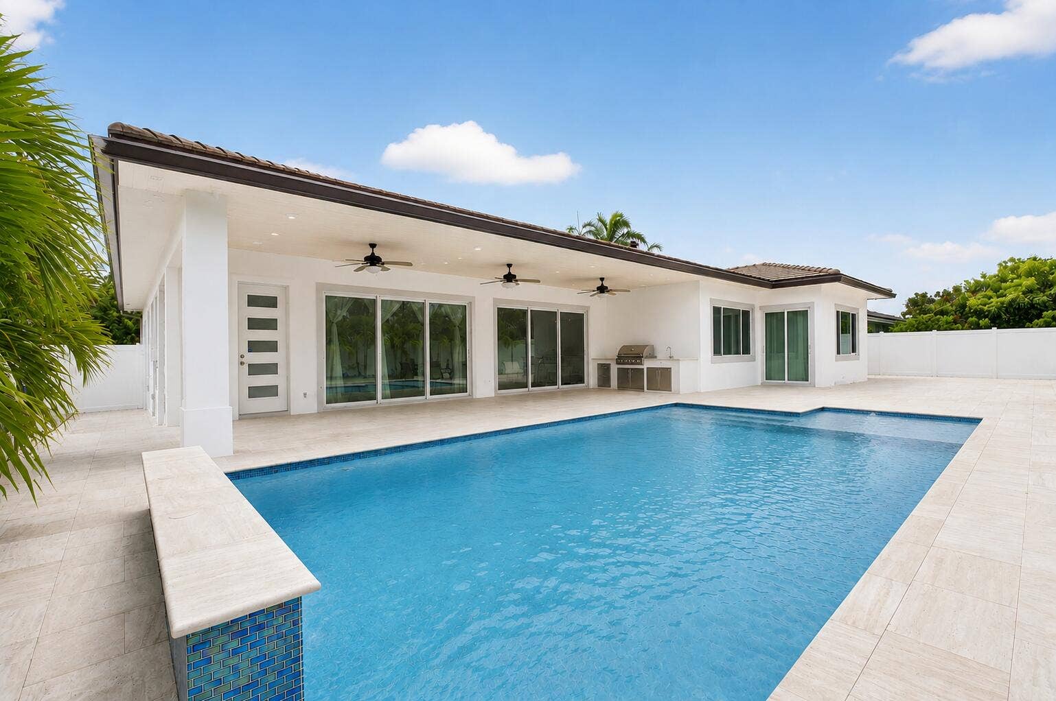 711 NE 6th Street, Boca Raton, FL 33432 Pool area furniture removed digitally