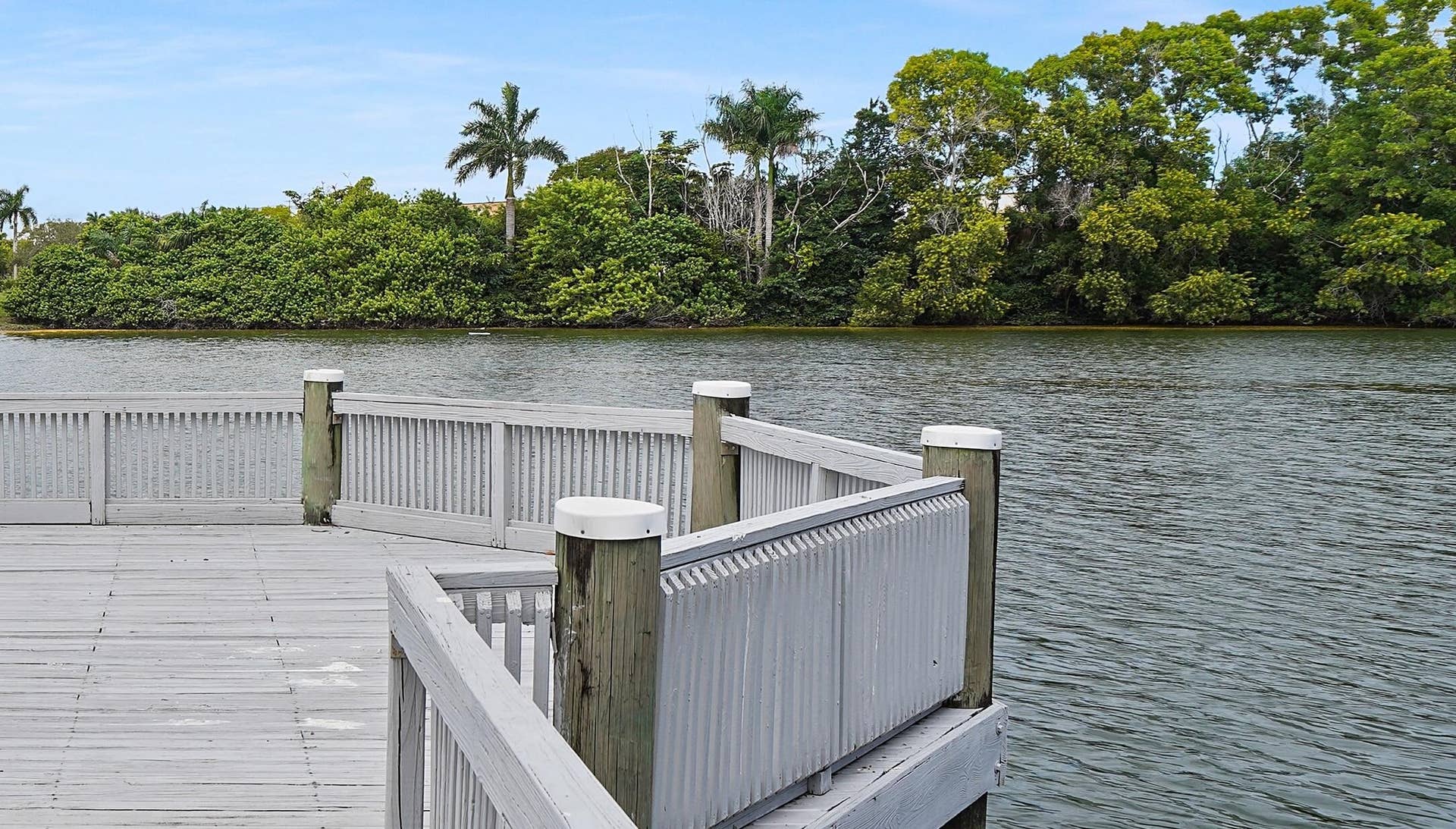 5222 Majorca Club Drive, Boca Raton, FL 33486 Walk-out Pier over Community lake.