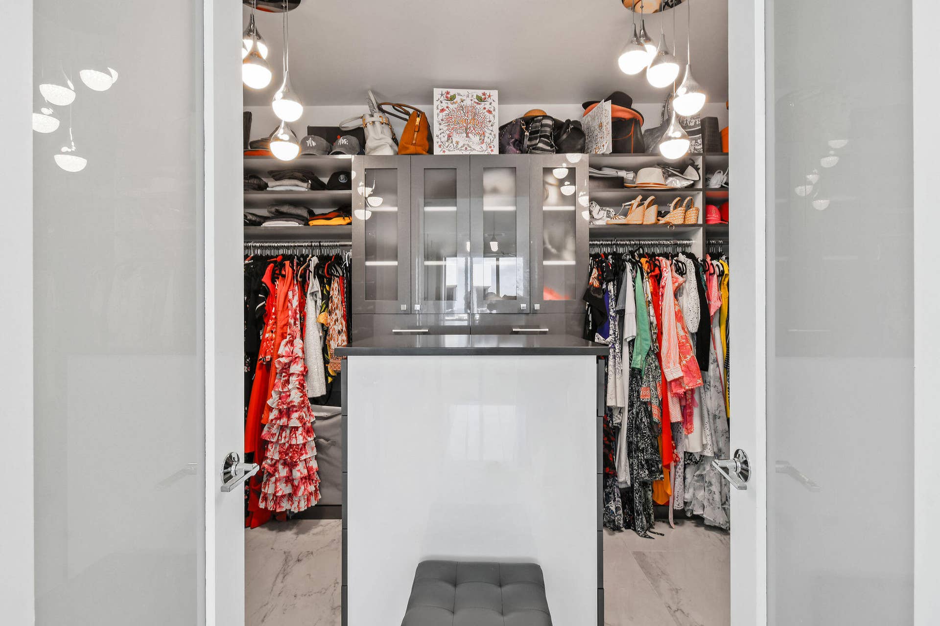 Primary Suite Walk In Custom Closet